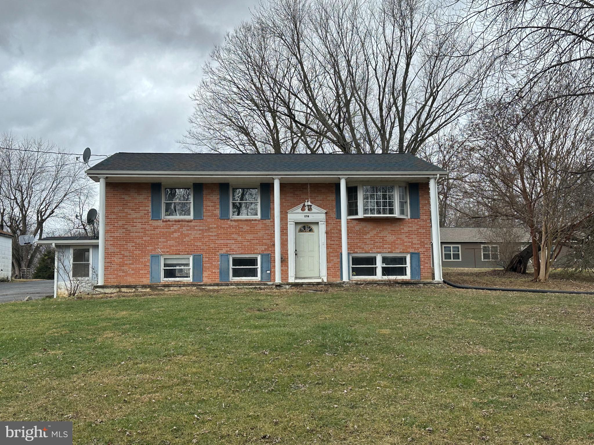 Charming Home with Endless Potential – Perfect for Investors or Personalization!
This property is full of possibilities and ready for your personal touches! NEWER ROOF. Located just minutes from the Charles Town Race Track and a great commuter location, this home offers a great opportunity for investors or those looking to create their dream space.
The main level features a spacious living room, a kitchen with a dining area, and well-sized bedrooms along with a full bath. The walk-up basement, with just three steps to level ground, includes a family room, an additional bedroom, a bathroom, and a laundry area—ideal for extra living space or guest accommodations.
A versatile mudroom connects to the oversized attached garage, offering space for storage or a potential office area.
Nestled in a quiet Bakerton location, this home is a short drive to the charming downtown areas of Harpers Ferry and Charles Town, WV, providing a perfect blend of tranquility and convenience.
Don’t miss this opportunity to customize this property to fit your vision!