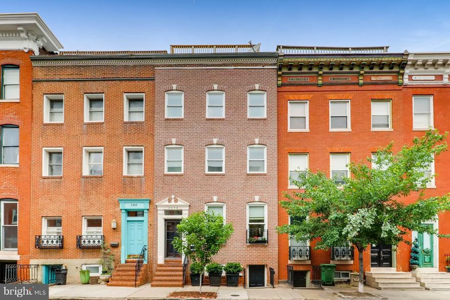 Stunning & grand 20' wide Butchers Hill home w/ brand new high end kitchen w/huge pantry,giant dining room,3 bedrooms w/en suite baths,large second floor family/bonus room,huge master suite, 5 working fireplaces! 3 beautiful outdoor spaces: patio, second floor balcony, plus newly rebuilt roof deck with amazing city and water views. Bonus: large, tall, walk out basement. Leased parking across st.