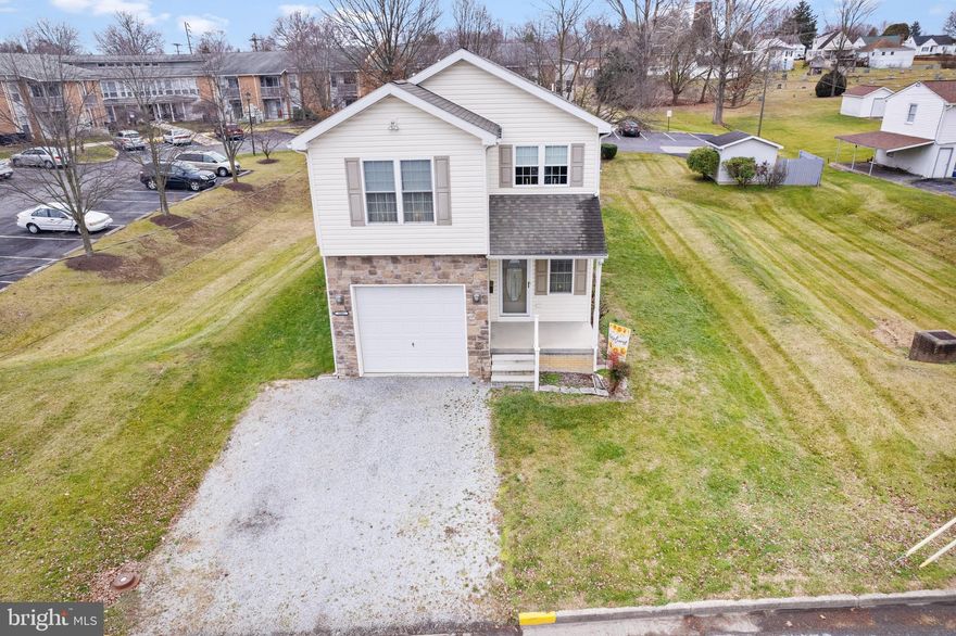 You are not going to want to miss this one! Cozy, charming, colonial with 3 beds and 3 full baths! Very low maintenance, not a lot of yard to mow but still enough to enjoy the comfort of your own space and privacy. Must see to appreciate, home looks a lot bigger inside.  Front and back porch that is covered to enjoy those warm summer nights. Step inside the foyer and you will bet amazed at the vaulted ceiling and beautiful LVP flooring throughout.  Home is very nice and open, enjoy the combined living/dinning area for gatherings or entertaining. 40" stairway, hallway balcony, vaulted ceiling also in large MBR, MBA w/double sinks, 10 jet tub & lighted walk in shower, Walk in MBR closet (6'x8'), Double sinks in 2 BA, Ext OSB, crawl space, 8" walls, storage building on concrete pad, Elect Heat Pump w/ Natural Gas Backup, Hot Water recirculates (instant hot water), 30 year Architectural Shingles. 12' tall garage (13'x21')w/ 10'x9' door, Gas line taps (for LR FP, outside grill & generator). Conveniently located to 81, MD & VA.