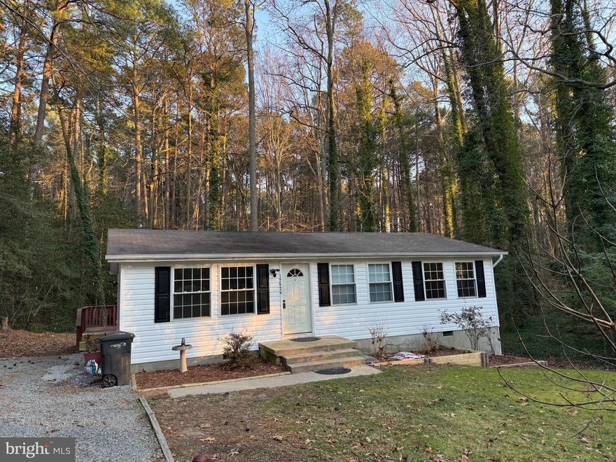 Water access community with lovely beach area. 3 bedrooms 1 bath home with deck and shed in back. Laminate flooring. Eat in kitchen with laundry closet. Painting is ongoing  currently. Be in your own home for planning for Spring and more fun in the warmer weather.