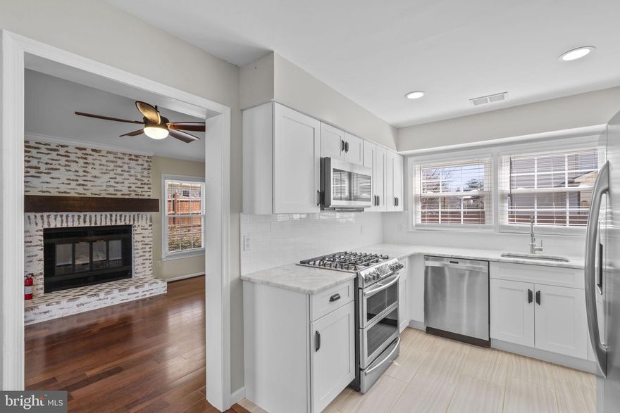 Welcome to this beautifully updated 3-bedroom, 2.5-bath Colonial in the desirable Newgate community of Centreville. Offering approximately 1,800 square feet of living space, a 2-car garage, and a thoughtfully updated interior, this home blends classic charm with modern improvements.

The current owners have invested in numerous upgrades throughout the home. The attic has been enhanced with additional insulation, expanded storage space, and a reflective radiant barrier to help keep the home cooler in the summer months. Lighting has been refreshed throughout with updated recessed lights, new fans, modern fixtures, and updated switches and outlet covers.

The family room fireplace has been updated with a custom mantle and built-in storage, creating a beautiful focal point and functional gathering space. The kitchen has been enhanced with additional pantry storage designed to match the existing cabinetry, and the laundry room now features durable luxury vinyl plank flooring.

Energy efficiency and curb appeal were also priorities. The home features a new energy-efficient front bay window, a new front entry door, and updated exterior lighting on the garage and throughout the yard. The garage has been freshly painted and upgraded with an epoxy-coated floor, providing a clean and durable workspace.

Exterior improvements include freshly painted shutters, trim, and gutters using the newly approved HOA color palette, along with updated landscaping in the front yard. A new retaining wall with proper stonework was installed, pavers were removed, and the yard was regraded and sodded last year.

Situated on a 6,500+ square foot lot with a fully fenced backyard, this home offers space to relax, entertain, and enjoy the outdoors. Conveniently located near major commuter routes, shopping, dining, and parks, this home offers the perfect combination of comfort, updates, and location.