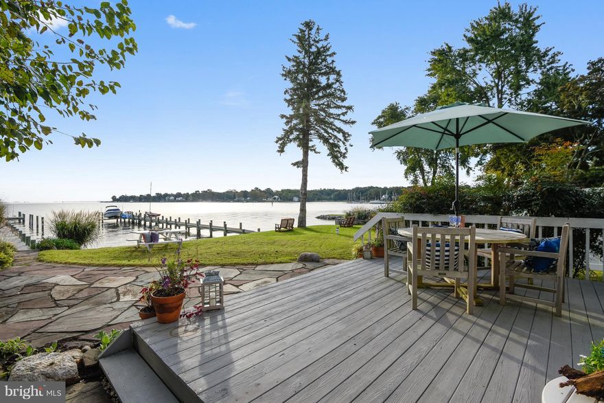 There is no Place Like 1011 Magothy Avenue! Panoramic Deep Water Views, Private Pier, Beautifully Renovated 3 BR, 2.5BA Home with Walls of Windows, Tastefully Decorated with Reminders of Your Beach Vacations, Gorgeous Gourmet Kitchen Open to Great Room and 180 Degree Views of the the Deep Water. Upper Level Owner's Suite has Private Screened Porch Overlooking the Water , Bathroom and Fireplace too.  Main Level Family Room could Be Main Level Bedroom.  Main Level Powder Room Still Has Plumbing for Full Bathroom , if needed.  Detached Garage has an 12' x 11'  Maiin Level Office,   Mud Room and Upper Level Finished Studio 17' x 25' with Cedar Closet and Balcony Too.Community Offers Boat Ramp, Kayak Rack, Picnic Area , Playground, Clubhouse and Beach on the Magothy all for Just $45 per Year.Welcome Home to your Piece of Paradise!