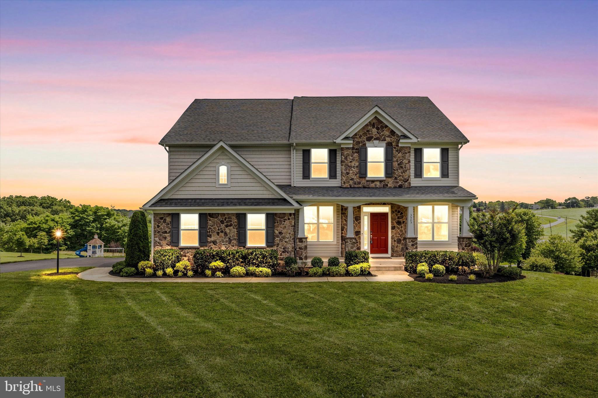 A Lifestyle of Luxury, Space, and Elegance in Gladhill Estates – NO HOA – Urbana High School District
Set on 2.07 beautifully landscaped acres, this exceptional Buchanan model estate home in the highly sought-after Gladhill Estates community, offers a refined living experience designed for those who value both sophistication and comfort.
Before you even step inside, a welcoming front porch with striking stone accents sets the tone for what’s to come, comfort, and thoughtful design. Inside, rich hardwood flooring leads you through a gracious main level ideal for both entertaining and everyday living. Just off the entry, a sun-filled flex room currently styled as a cozy sitting area offers versatility—it can easily function as a formal dining room, second lounge, or a space tailored to your needs. A private home office with French doors provides the perfect setting for working remotely or quiet reading.
The two-story great room draws your eye upward with its soaring ceilings, while oversized windows flood the space with natural light and serene views of the lush, private landscape.
At the heart of the home is a gourmet kitchen that exceeds expectations. Designed with a grand oversized island, granite countertops, a stylish designer backsplash, custom cabinetry, and high-end stainless-steel appliances, including a smart double oven and a gas cooktop—this kitchen is both functional and elegant.
Just off the kitchen, a bright sunroom is ideal for casual meals, morning coffee, or simply relaxing while taking in peaceful backyard views. Nearby, you’ll find a powder room and access to the side-entry two-car garage. A walkout door leads to your future dream deck, positioned perfectly to capture tranquil green views.
Upstairs, the luxury primary suite offers a private retreat with double-door entry, a sunny sitting area, a wraparound walk-in closet, and a spa-like bath featuring dual vanities, a soaking tub, and a separate glass-enclosed shower. Three additional bedrooms all with walk-in closets and a full bathroom complete the upper level.
The walkout basement offers a blank canvas for your vision—whether it’s a home theater, fitness center, game room, or wine cellar.
Step outside to an impressive custom stone patio with a built-in fire pit—perfect for relaxing evenings under the stars. The spacious backyard is equally functional and fun, with a top-tier playground and a well-maintained shed, great for extra storage or a future garden workshop.
With easy access to I-70 and I-270, and zoned for Urbana High School District, this home combines luxury, location, and lifestyle into one extraordinary offering.
Reach out today to schedule your private showing—homes like this don’t come around often.