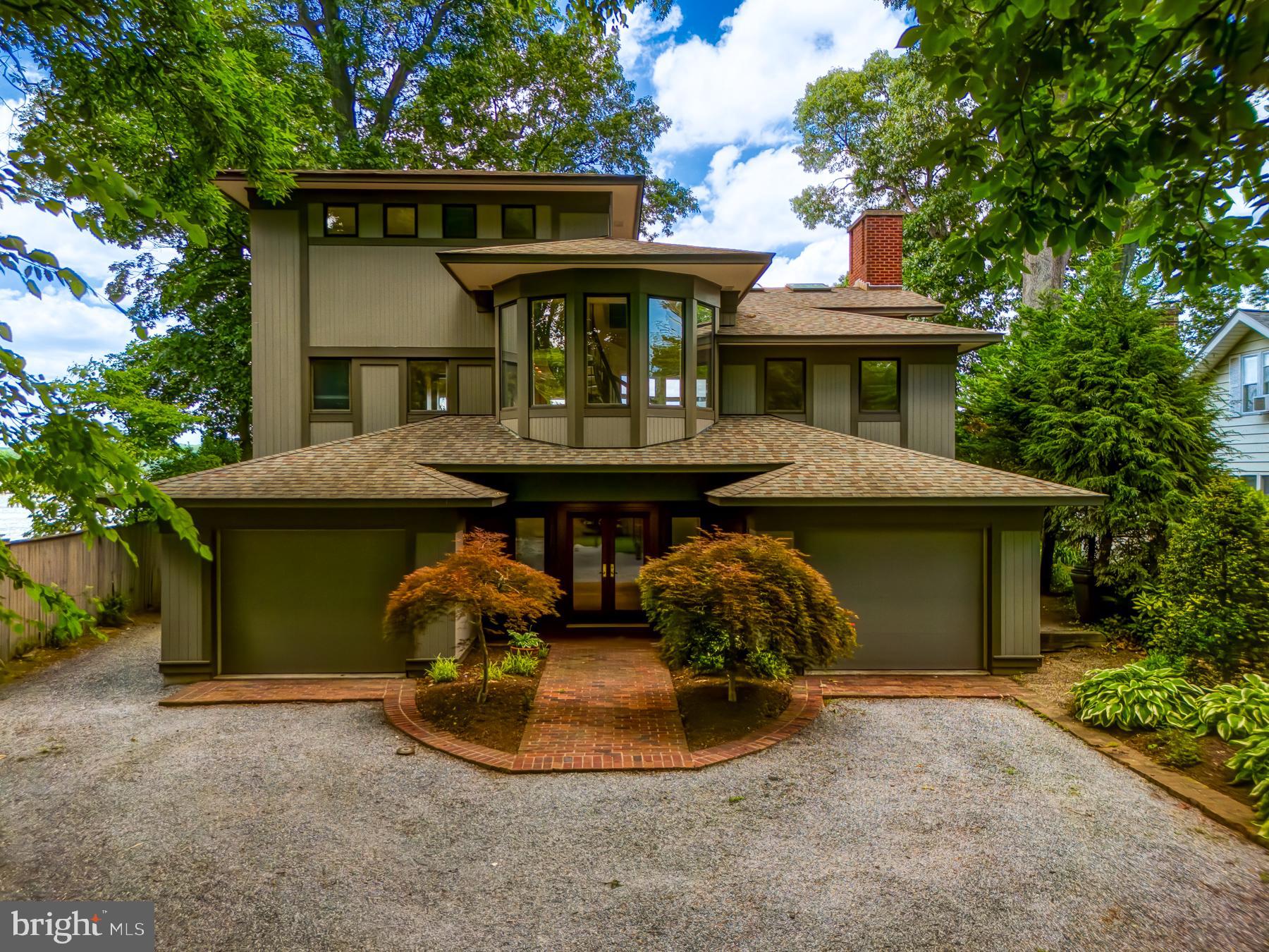 **THE OFFER DEADLINE HAS BEEN SET FOR MONDAY JUNE 24TH, 5 PM.**
Welcome to your new waterfront home! This beautifully maintained Contemporary Custom Home,
built in 1987, designed by Architect Chip Bohl awaits you in the desirable Edgewater Beach community's "Shady Section," perched above the South River in Edgewater, Maryland, between the
Riva & South River bridges. Enjoy direct water access and your
private dock featuring deep water slips, electricity, and water connections.
Discover the unique architecture of this 3-level, 2,548 square-foot residence
showcasing exquisite unobstructed views of the South River.
On the entry-level, you'll find a spacious foyer, two large bedrooms with an adjoining
bathroom, two single-car garages, and direct access to the side yard.
Ascend the beautiful spiral staircase to the second level, where breathtaking views
await. This level offers ample space for relaxation and gatherings, featuring a Great
Room with a wood-clad vaulted ceiling with skylights, and propane-fueled fireplace.
This level has direct access to the rear deck and yard, dedicated office, dining room,
and table space kitchen. Additionally, there's a laundry/butler's pantry and a powder
room,
The primary suite occupies the third level, boasting a private balcony, a large ensuite
bathroom with a Jacuzzi tub, separate shower, and water closet, as well as built-in
dressers, storage, and cedar closets.
This home is equipped with an Electric Power Backup Generator for unforeseen
power outages, ensuring your comfort and peace of mind.
Other notable features include a Water Filtration system for quality water throughout
the home.
Residents have the option to join the voluntary community association, which offers
various benefits such as reserving the beach shelter for parties, leasing a boat slip,
accessing the boat ramp, and contributing to the upkeep of community assets.
Additionally, members may participate in volunteer opportunities, such as beach clean
up and other communal tasks.
Don't miss this opportunity to make this stunning waterfront property your new home!
Do you have a small Airplane? This home is close to the private Lee Airport - ANP. Lee Airport is a public-use airport.
Professional photos will be uploaded no later than June 13th.