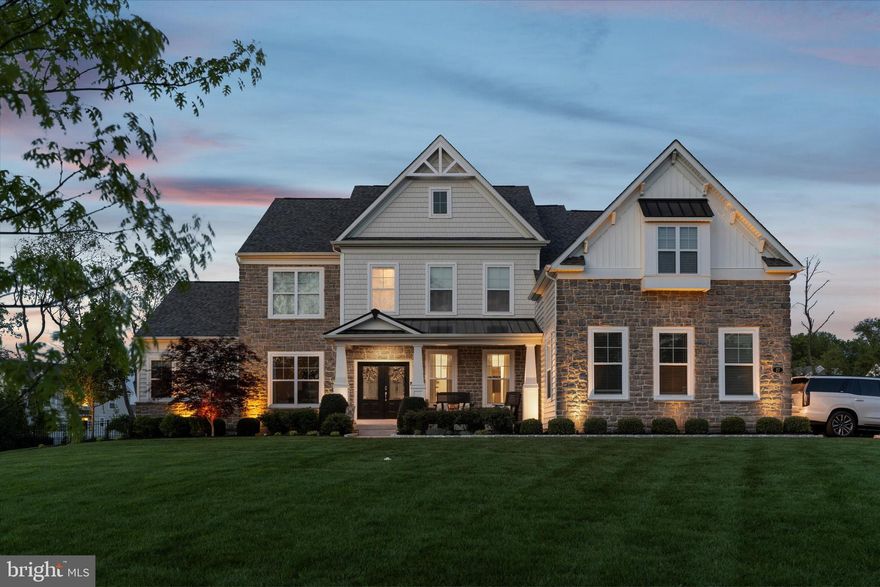 Welcome to an extraordinary opportunity to own a custom-built estate in the exclusive, private-road enclave of Founders Reserve at Providence. Set on nearly an acre of beautifully landscaped grounds within the highly regarded Spring-Ford School District, this 5-bedroom, 5.5-bath Designer Showcase Home offers over 6,000 square feet of impeccably crafted living space, including a fully finished walk-out lower level.

Built in 2019 with a focus on elegant design and modern functionality, this residence makes a grand first impression with a soaring two-story foyer and richly appointed formal dining room featuring a tray ceiling, crown molding, and custom millwork. Beyond, the open-concept layout flows seamlessly into a sophisticated living room and a dramatic two-story great room centered around a cozy gas fireplace and flanked by an upper-level overlook—ideal for entertaining on any scale.

The heart of the home is the chef-inspired kitchen, thoughtfully designed with high-end appliances, a walk-in pantry, a sunlit breakfast area, and an adjoining butler’s pantry. A spacious laundry room, private in-law suite, home office, flex/playroom, and a den complete with cabinetry, sink, and mini fridge further enhance the main level, offering versatile space perfect for multigenerational living.

Upstairs, the serene owner’s retreat beckons with a tray ceiling, three custom walk-in closets, and a luxurious spa-style en-suite bath with soaking tub and walk-in shower. A princess suite with private bath, along with two generously sized bedrooms and a hall bath, ensure ample comfort and privacy for family and guests.

The lower level is an entertainer’s dream, boasting a state-of-the-art theater room, designer wet bar with sink, refrigerator, and dishwasher, a fitness room, a wine closet, a full bath, and two large unfinished spaces for future customization or storage.

Step outside to your own private resort: a sparkling heated saltwater pool & spa with a slide, a basketball court, a vast paver patio with built-in grill and sink, and a fenced backyard framed by mature trees for ultimate privacy.

This fully integrated smart home offers cutting-edge convenience with a centralized control system for lighting and music, a 3-car garage with Tesla charger, a 3-zone HVAC system, and an in-ground sprinkler system that maintains the lush, manicured landscaping.

Experience the pinnacle of estate living—where timeless elegance, modern luxury, and thoughtful functionality converge in one of the area’s most prestigious communities.