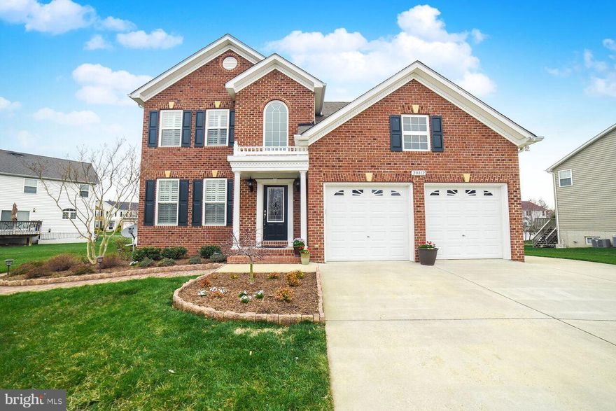 Beautiful brick home with many upgrades. The landscape itself front and back is completely done with a he/she shed and hardscape with sprinklers and extra car pad. Sunsetter retractable awning.  Open floor plan with 4 bedrooms  3.5 baths.  Inlaw suite in lower lev.  Tiled floor in the kitchen with upgrades, appliances including advantium wall oven, plantation shutters.   Wood floors on main level.