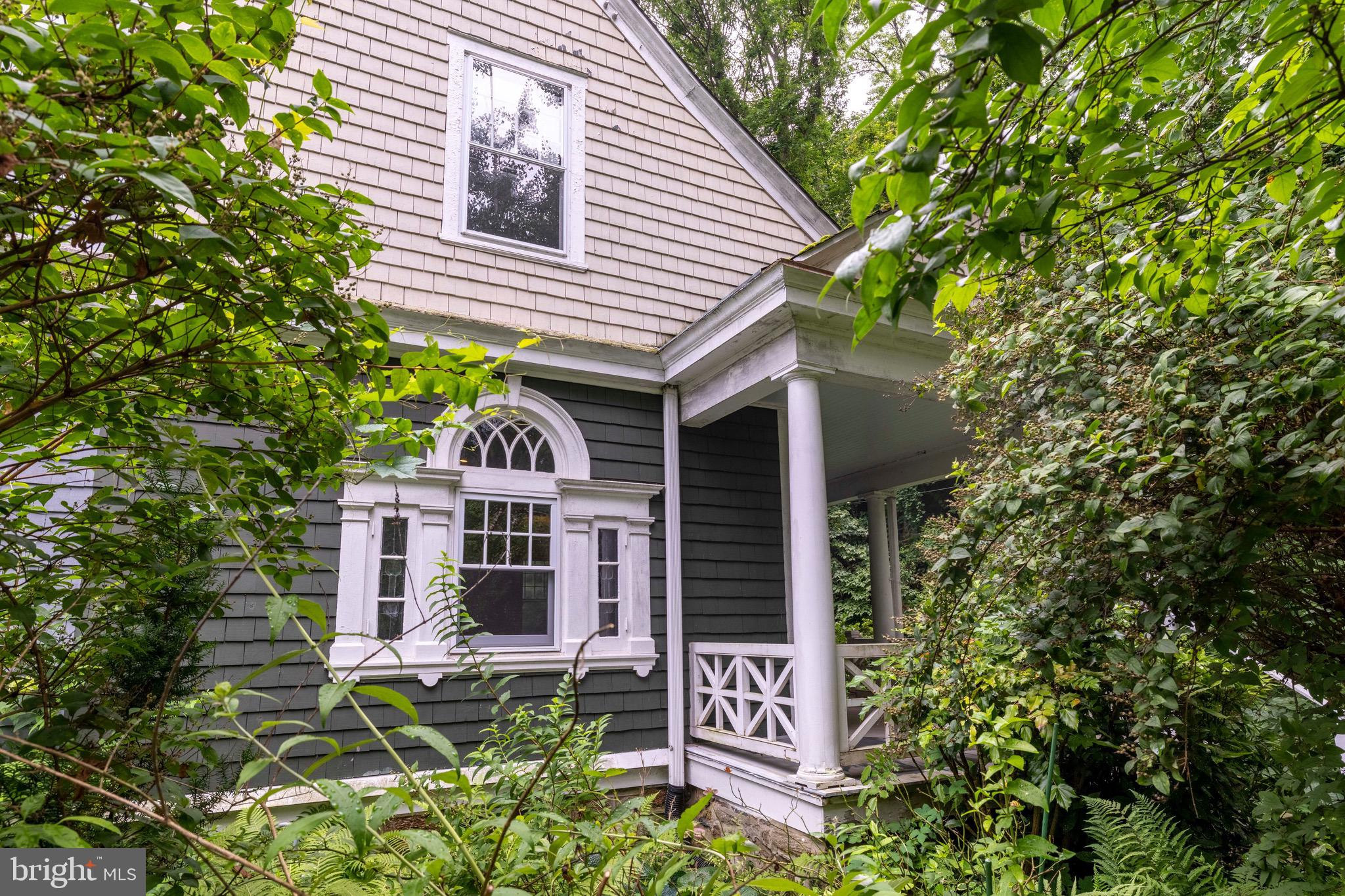 Historic Olde Wyncote "carpenter's twin" set on 2 parcels in Cheltenham Township at the end of a quiet, charming dead-end street within minutes of the Jenkintown Train Station. A large inviting front porch leads you into the foyer, living room and formal dining room - all with large windows, 9' ceilings, original millwork and hardwood floors. The spacious kitchen features an exposed brick wall, stainless appliances (gas range, refrigerator, dishwasher) laundry with a door to a deck (deck is slippery and in need of some repairs) and fabulous private yard with mature trees and plantings. A full bath with roll-in shower completes the first floor. The second floor consists of 3 bedrooms, a full bath with tub/shower and stairs leading to the 3rd floor with 4th bedroom and large 5th bedroom (no heat in L-shaped bedroom according to seller). There is plenty of closet space. A full unfinished basement with Bilco doors leads to the yard. Gas hot air heat. There is a driveway for 3 car parking. Close to quaint Jenkintown for restaurants, shops and close to Route 309 and the PA Turnpike access. If you are looking for a large twin on a wonderful street, this home is just waiting for you to make it your own. Property is being sold in "AS IS" condition.