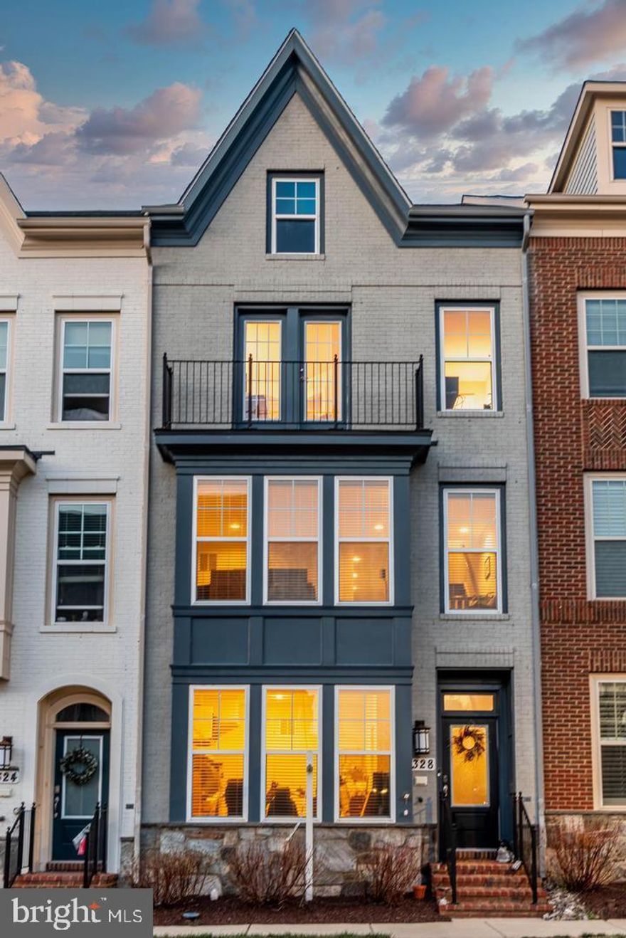 This spacious townhome in Crown Farm  home feature gas appliances, recessed lighting, loft with terrace, and owner's spa bathroom.  The open living  family room features direct access to the deck and the great room . Downstairs, the 2-car rear load garage opens directly into your finished rec room. The third floor includes a private owner's suite tucked away at the rear of the home complete with huge walk-in closet and luxurious bath featuring dual vanities and oversized shower. Two comfortable guest bedroom, hall bath and convenient laundry complete this level. The fourth floor offers a  spacious loft with plenty of room for entertaining and a 20' x 10' rooftop terrace, perfect for enjoying the outdoors!  This home features: Finished Rec Room, Loft, Rooftop Terrace, Gas Appliances, Smart Urban Living, Close To Metro This home is only a block over from everything the Crown has to offer- shopping, restaurants, gym, and so much more.