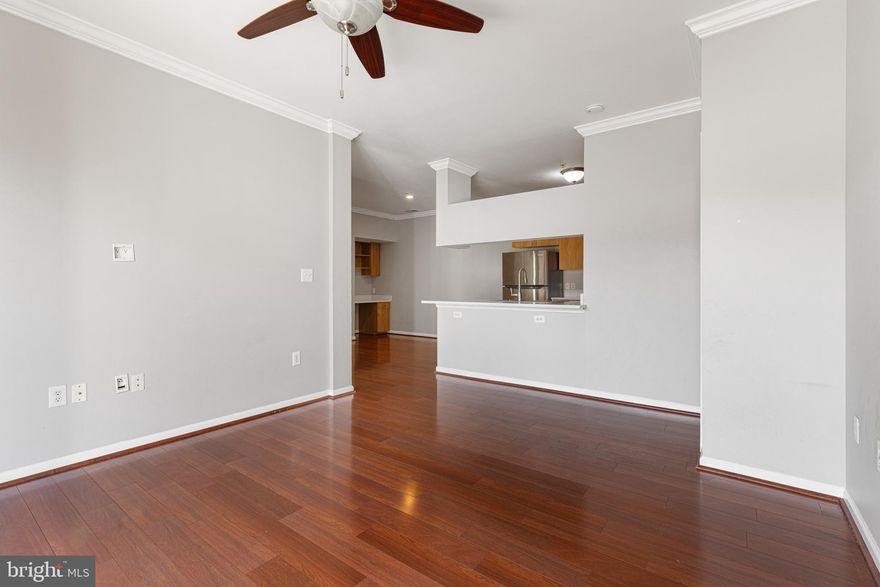 Welcome to this amazing 2-bedroom, 2-bathroom condo in the highly sought-after Ashmore condominium community in Germantown! This beautifully updated unit features a thoughtfully designed layout with bedrooms located on opposite sides for added privacy, each with its own spacious walk-in closet and a linen closet in both bathrooms.

The open floor plan includes cherry wood floors in the family and dining rooms, tile flooring in the kitchen and bathrooms, and plush carpet in the bedrooms. The updated kitchen boasts stainless steel appliances including a new refrigerator, microwave, dishwasher, and stove. A built-in desk provides a convenient workspace, and the unit includes a full-sized washer and a brand-new dryer for ultimate convenience.

Enjoy relaxing on your private balcony overlooking the community pool. This unit includes two assigned parking spaces (40 & 41) and ample guest parking. Plus, you’ll have direct access to the association swimming pool—just steps from your door!

Residents enjoy access to top-notch community amenities, including a 24-hour fitness center, hot tub, business center, and a community center available for events. Take advantage of the walking and biking trails that wind through the neighborhood, providing the perfect escape into nature.

Convenience is key with a prime location near Germantown Plaza and Germantown Commons, offering easy access to Safeway, Wegmans, Target, Wal-Mart, Home Depot, TJ Maxx, Walgreens, and more. Dining options include local favorites like Mission BBQ, Mezeh Mediterranean Grill, Sabai Sabai Simply Thai, and Chipotle. For entertainment, you're just minutes from TopGolf, Regal Movie Theater, and BlackRock Center for the Arts.

This unit combines modern comfort with a vibrant community lifestyle—don't miss your chance to make it yours! Schedule a showing today!