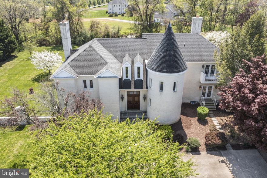 PRICE IMPROVEMENT.....Time to be the king of your very own castle and this one-of-a-kind home is ready the next generation of royals to move on in!  This gem sits on over 2 acres with an awesome completely usable flat lot.  5 bedrooms, 6 full baths, 2 half baths, 3 fireplaces, and a 3-car garage...Main level includes a stately parlor style grand foyer w/marble floor, home office w/custom built ins, formal LR, DR, & FR with wood floors, and 2 half baths.  Gourmet Kitchen with newer new tile floor, cook top, & wall oven which leads to the deck and outdoors.  Follow the spiral wood steps to the upper level and you will find the Owner Suite which also includes wood floors, its own private balcony, trey ceilings, dressing area, 2 walk in closets, super bath with jetted tub.   Each of the additional 3 beds on the upper level have own full bathroom and great closet space.  Lower level is perfect for family entertaining or his man cave.  Rec Room w/fireplace, bedroom, home gym, den, and 2 full baths.  Other features include 5 HVAC units for detailed heating and cooling, freshly painted, circular driveway, deck/patio with water fountain, fenced main yard, walking distance to Greenbriar Park, and much much more.  ***A TRUE MUST SEE***