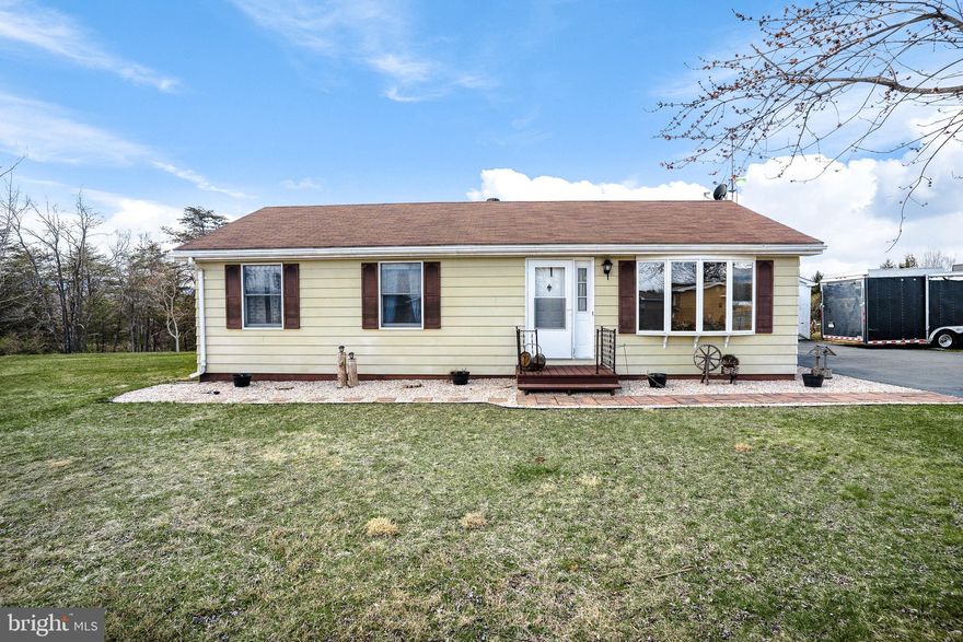 Adorable single family home on 1.4 acres of unrestricted property.  This home has been lovingly cared for and is ready for its new owners.  The large lot has two detached sheds on concrete pads and a single car detached garage (concrete floor) with a wood stove so you can work on your projects even when it's cold outside.  Enjoy the warm weather on the huge patio (32x25).  Inside you will find new laminate flooring in the kitchen, living room and hall.  The bathroom was remodeled within the last year.  The roof was replaced 3 years ago.  Schedule your showing today!!!