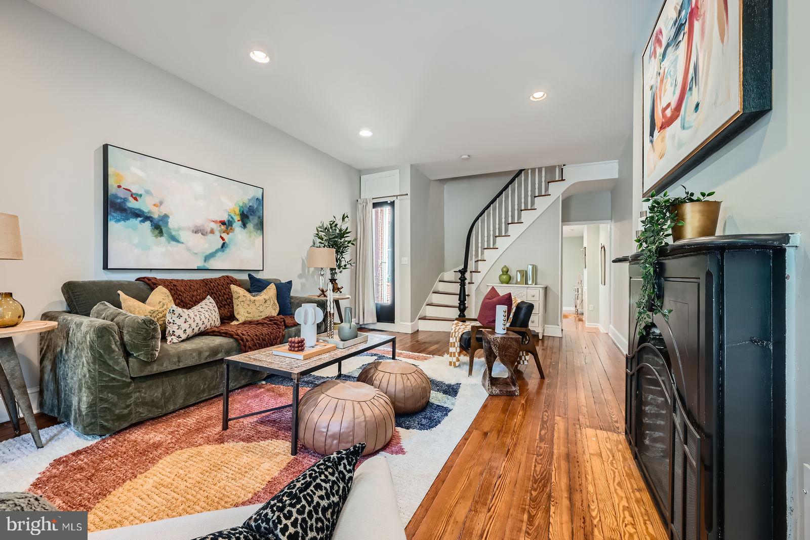 This home checks every box: historic charm, space, updates, and location. Don’t miss your opportunity to own in one of Baltimore’s most iconic neighborhoods, home to the SOWEBO Arts and Music Festival, The H. L. Mencken and Historic Hollins Market. This previously renovated 3-story rowhome is just half a block from Union Square Park! 111 S Stricker St has thoughtful upgrades and stylish details throughout.
Bright, modern kitchen with white cabinets, quartz countertops, and stainless steel appliances. Coveted main level 1/2 bath! 2nd floor has 2 bedrooms and an open office/studio flex space and a separate laundry room. Spacious third-floor primary suite with oversized spa like bathroom. Enjoy the outdoors with a fenced rear yard, hardscaping, a rear deck, and a cozy second-floor balcony off the second bedroom. Classic Baltimore rowhouse feel with contemporary comfort. Ideal for commuters — close to two MARC stations and major routes heading south and easy access to I83 North.