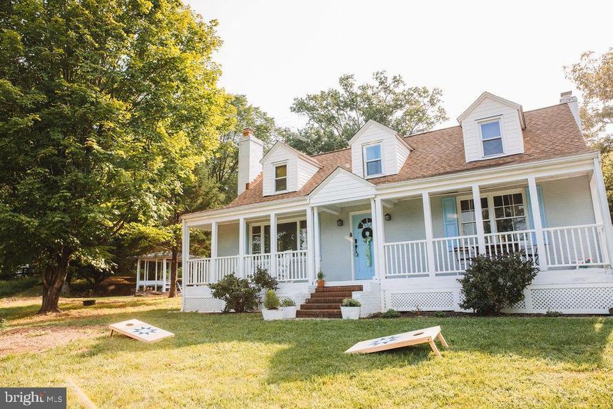 12242 Harpers Ferry Rd is a thoughtfully maintained home in Purcellville set on a 2.5-acre lot, offering a flexible floor plan, meaningful recent updates, and AR-1 zoning with no HOA. The main level features a bedroom and full bathroom, while the upper level offers two additional bedrooms, a bonus room ideal for a nursery or home office, and a second full bathroom.

Interior features include hardwood floors throughout, built-in shelving, and inviting living spaces centered around a wood-burning fireplace. The kitchen offers granite countertops, tile backsplash, and stainless steel appliances, flowing naturally into the dining area. A main-level laundry area adds everyday convenience.

Outdoor spaces are a standout feature. A welcoming front porch with mountain views provides a peaceful place to relax, while the rear crushed bluestone entertaining area with gazebo offers a private and well-defined outdoor living space ideal for gatherings, relaxation, or hosting guests. The 2.5-acre setting provides a sense of privacy while remaining accessible to nearby towns.

Major system improvements were completed in 2025, including a new architectural shingle roof and new septic system, providing long-term peace of mind.

Located in the heart of Western Loudoun County, near Purcellville, Hillsboro, and Harpers Ferry, the property offers convenient access to local towns, the surrounding countryside, and the region’s vineyards. Well suited for a primary residence, secondary home, or investment opportunity.

The property is currently used as a short-term rental, with bookings already in place for 2026. Existing reservations may be canceled if necessary, allowing flexibility for an owner-occupant or continued rental use.