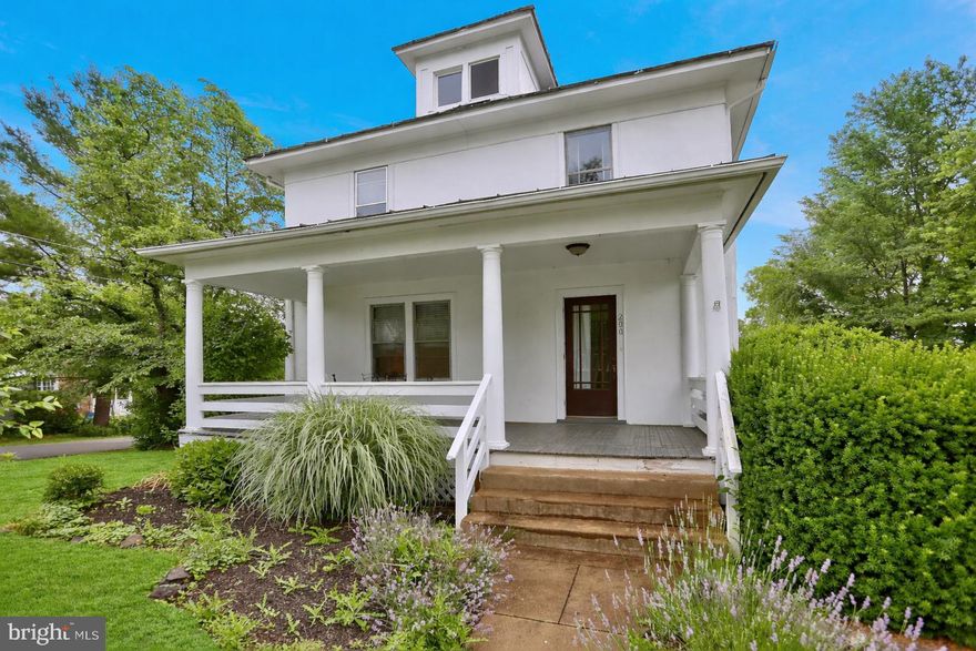 Lovely historic Colonial situated on a 0.24-acre corner lot in the heart of Purcellville, offering the ideal blend of charm, walkability, and in-town living. Just steps from Loudoun Valley Community Center, Fireman’s Field/Bush Tabernacle, and Emerick Elementary School, this location is hard to beat.

The home offers nearly 2,000 square feet across two levels. The main level features spacious living and dining rooms accented by original wood trim and views of the large front porch overlooking quiet Orchard Drive. The kitchen includes recently painted cabinetry and newer appliances, providing modern updates while maintaining the home’s historic character.

Upstairs, a full bathroom renovated less than a year ago showcases a large walk-in tiled shower with a frameless glass enclosure. Four upper-level bedrooms, all with closets, offer flexible living options. One generously sized bedroom includes an adjoining bonus room—ideal for a home office, additional closet space, exercise room, or potential conversion to a primary bathroom with proper permits and approvals.
Hardwood flooring exists beneath all carpeting, with new carpet installed on the main level in 2025. Additional updates include a new refrigerator, dryer, and range in 2025. A detached shed provides convenient storage for gardening tools or outdoor equipment. Off-street parking is available on W K Street and along Orchard Drive.

A rare opportunity to own a historic home in one of Purcellville’s most desirable and walkable locations.

*Photos are virtually staged*