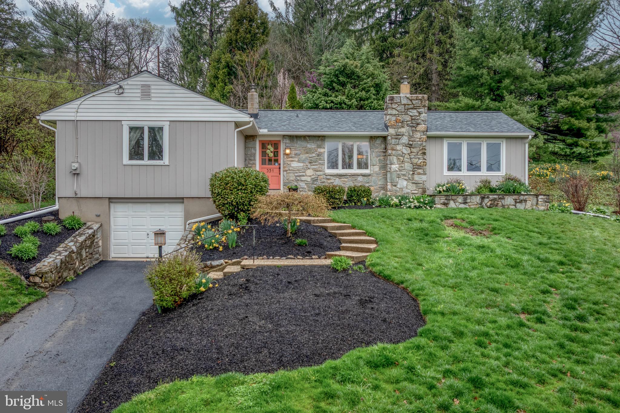 Welome to 351 Old Delp Road, a single family home, situated on Blossom Hill. The property features 3 bedrooms, 1.5 baths, and approximately 1606 sq ft of living space on a .36 acre lot. It includes amenities such as: granite countertops, hardwood floors, a wood burning fireplace and a remodeled bathrooms. Additional features include: a screened porch and deck overlooking a waterfall, an oversized one car garage, and a partially finished basement that could serve as a recreation area. The home is in walking distance to overlook park.