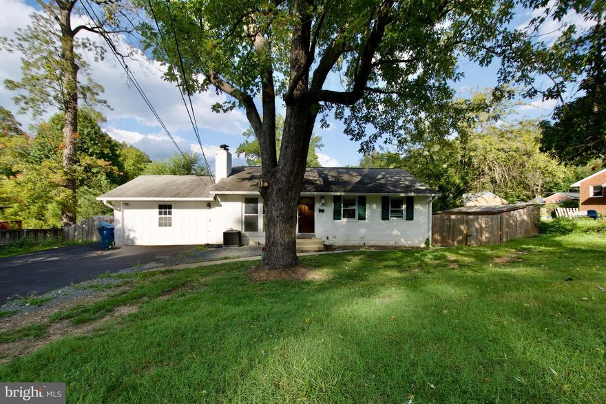 North Springfield — Ready for your Vision!

This spacious 4-bedroom, 2 bath rambler offers a spacious layout and versatile footprint—ideal for investors, multi-generational households, or buyers ready to customize. The main level features hardwood floors, expansive windows that flood the living area with natural light, and a cozy wood-burning fireplace. The updated open kitchen offers white cabinets, granite counters, stainless steel appliances, and an island. The main level also includes three bedrooms and a hall bath.

Downstairs, the finished lower level offers durable LVP flooring, a recreation room with a second fireplace, and a flexible in-law suite with its own efficiency kitchen and private entrance—ideal for multi-generational living, guests, or rental income. 2 bonus rooms, and laundry complete this level.

Outside, enjoy a flat, fenced backyard with a deck and patio—ready for weekend barbecues or future landscaping dreams. Ideal location, just minutes to Lake Accotink, Audrey Moore Rec Center, and shopping and dining galore at Springfield Plaza and Springfield Town Centre. With easy access to commuter routes (395/495) this home offers convenience and potential in equal measure.

The bones are strong, the layout is versatile, and the possibilities are yours to shape. Come envision what’s next.