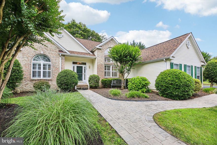 Welcome Home to 1107 Severn Pines Way — a rare opportunity to own a spacious rancher offering true main-level living. This beautifully maintained and thoughtfully updated home is the one you're waiting for! Tucked into a quiet community, this gem features a two-car garage and an expanded driveway that easily fits up to an additional five cars — ideal for everyday ease and effortless entertaining.

Step inside to a grand foyer that sets the tone with its elegant hardwood floors and opens to a formal dining room on the right. The main level living room invites you in with a cozy gas fireplace and custom mantel, flowing seamlessly into the open-concept kitchen and breakfast area. Recent updates (2019) include new cabinetry, modern appliances, and durable vinyl flooring, with custom shutters adorning the windows for both privacy and style.

Just off the kitchen, you'll find the convenient laundry room and access to the two-car garage — a functional layout that enhances the flow of daily living.

Enjoy peaceful mornings and relaxing evenings from the enclosed porch or step out onto the deck overlooking a tree-lined backdrop — the perfect setting for indoor-outdoor living.

The thoughtfully designed layout places the spacious primary suite on its own wing for added privacy, complete with a sitting room, large bedroom, and a beautifully updated ensuite bathroom featuring a double vanity, soaking tub, and separate shower. Two additional bedrooms are located on the opposite side of the home and share a full hall bath, offering a practical and comfortable layout for family or guests.

Downstairs, the fully finished basement provides incredible flexibility with four bonus rooms — ideal for a home office, gym, workshop, or creative space — plus a full bath to complete the lower level.

Notable updates include the roof (2020), HVAC system (2018), and water heater (2015), along with a whole-house gas generator and irrigation system for added peace of mind. This is a rare chance to own a move-in ready home with room to grow and modern amenities throughout. Schedule a tour today!