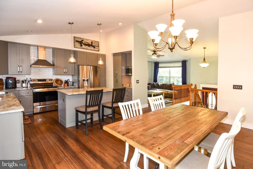 Welcome home to your amazing new house in Wicomico Shores! Convenient to everything you may need and close to the  nearby NAS Patuxent you won't be disappointed   This beautiful split foyer will take your breath away the minute you step in the house. If you love cooking you will never want to leave this gourmet kitchen that features granite countertops, new cabinets, stainless steel appliances, large island, and a new subway tile backsplash. Entertain your friends and family on your large deck while the kids or the dog play in the fenced in backyard. This home also features 3 bedrooms, 3 updated full bathrooms, new floors throughout, fresh paint, solar panels, vaulted ceilings, a one car garage, water access with a community boat ramp, golf course with a club house, and so much more. This house won't last long, so come see it today!!!