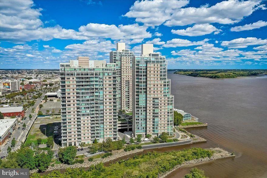 You're going to walk in, see the wall-to-wall water views, and you're going to smile.
The most sought-after view in all of Waterfront Square - An "02" unit in the Regatta! A beautiful corner two bedroom, two and a half bath gem affords sweeping east and south river views. A split floor plan with balcony, parking, and floor-to-ceiling windows! Also offering an adjoining storage room for an extra $20k! A second parking space can be rented! Waterfront Square is a beautifully maintained oasis with manicured gardens inside a gated community. An abundance of outside areas for relaxing, walking, or just getting out. Center City's largest private gym, pool area, and river deck. Yoga and Pilates Classes (additional), 24 hour Valet/Concierge, assigned parking OR valet parking, two dog parks, and a weekday daily shuttle to Center City are all offered at Waterfront Square!