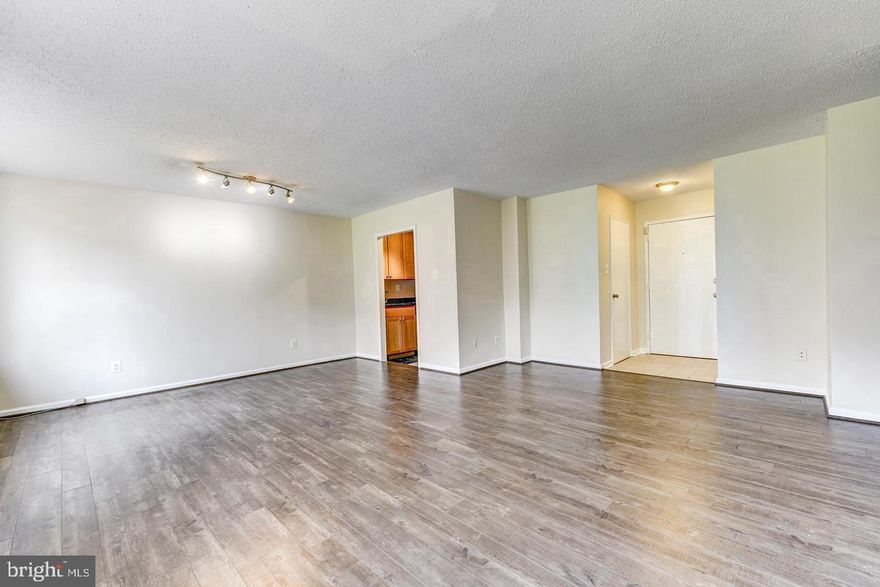 **AVAILABLE FOR IMMEDIATE MOVE-IN** Beautifully updated one-bedroom, one-bath condo in a prime location offering comfort, convenience, and value. The home features new flooring throughout and has been freshly painted, creating a clean, modern feel. The bright living area flows into the dining space and kitchen, making it easy to relax or entertain. Rent includes all utilities—electricity, gas, water, and trash—plus one assigned parking space and extra storage. Residents enjoy access to a rooftop deck, fitness center, and on-site laundry. Less than a mile away from Courthouse Metro and minutes from I-66, this home offers an easy commute and quick access to shops, dining, and everything the area has to offer. Schedule a tour to see for yourself!