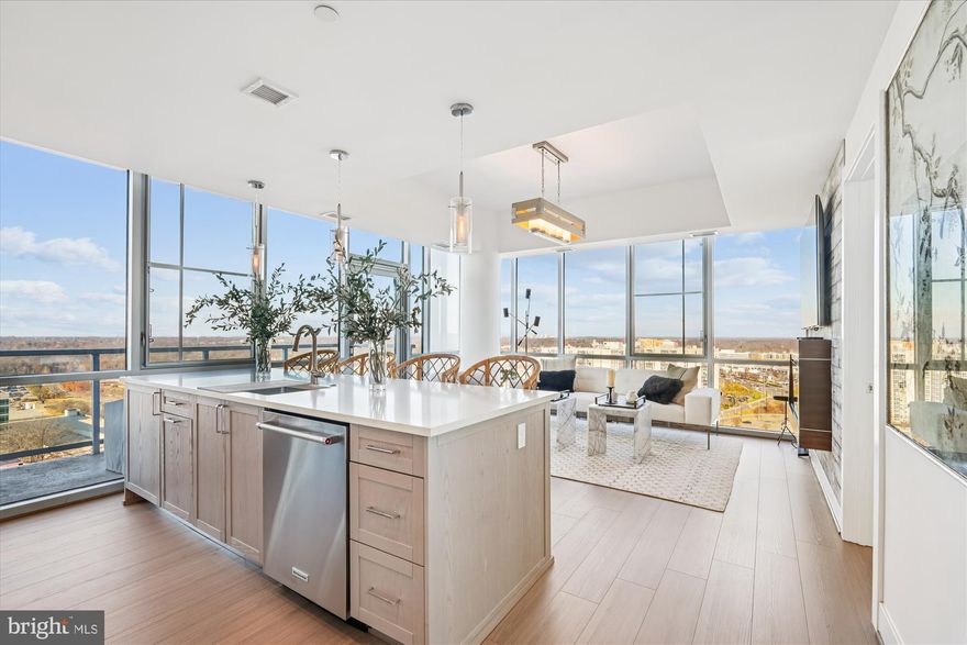 Availabe Dec 15, 2015. One parking space and one storage unit. 

Designer touches abound in this artistically appointed, sleek and modern 19th floor CORNER UNIT condo at 930 Rose in the heart of North Bethesda's highly coveted Pike and Rose. This 2 bedroom, 2 bath unit features floor to ceiling glass walls and your own private glass balcony to enjoy panoramic vistas as far as the eye can see including views of Sugarloaf and Bull Run. Highlights include custom wallpaper, impeccably appointed new open concept kitchen; living room with deep tray ceilings and electric fireplace; primary bedroom with  walk in closet, ensuite bath and double vanity; second bedroom with dramatic sweeping views, in unit stackable washer/dryer, hall closets, and a dedicated parking space. 930 Rose offers standout service with its fully-staffed concierge lobby, rooftop with indoor and outdoor amenities including 24-hour fitness center and otudoor grilling, and location near Metro, shopping, dining, and so much more. Pets allowed at owner's discretion on a case by case basis.