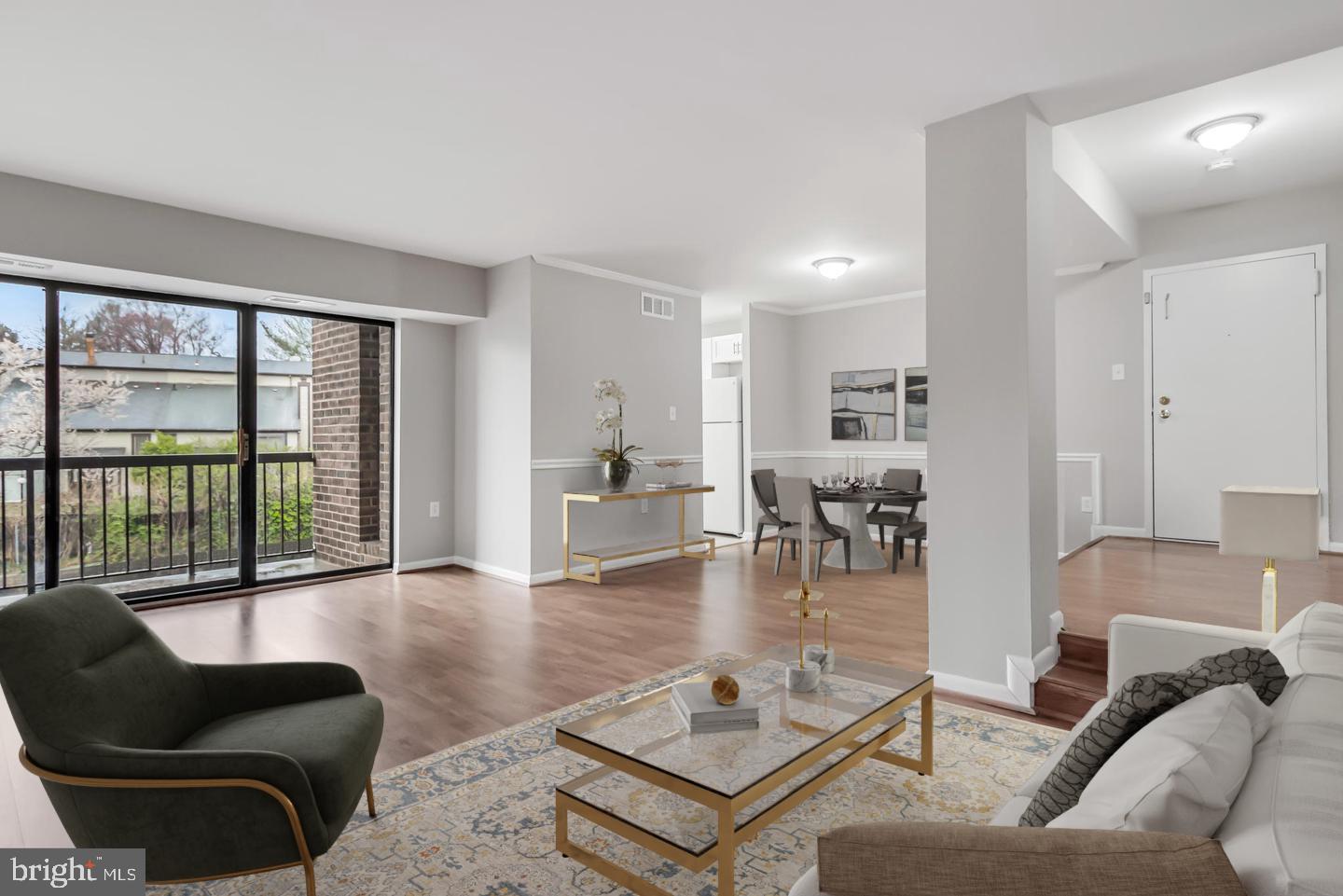 Affordable condo living in this charming 1 bedroom, 1 full bath with laminate/vinyl flooring and crown molding throughout. The living room/dining room combination opens to a private balcony. Tailored window treatments were added throughout for enhanced privacy and light control. The convenience of a washer & dryer in the unit. A brand-new stackable front-loading washer & dryer were installed in 2025. Whether it's entertaining or unwinding, the expansive living and dining area offers the perfect space. The condo was freshly painted in 2024. The bedroom boasts ample space along with a generously sized walk-in closet. Conveniently located between Baltimore and D.C., this home provides easy access to major highways, including I-95, I-495, and the ICC. Two permanent parking tags & two visitor tags are allowed per unit, along with a storage unit, and recently appraised at 212k in 2025. Home Warranty is offered. Residents of Brookmill Condominiums can enjoy access to community amenities, including a swimming pool and clubhouse. ***Furniture shown in photos is for virtual staging purposes. Some partial furnishings in the home can be left or removed upon request; however, they are not depicted in the photos.*** Back on the Market due to financing.