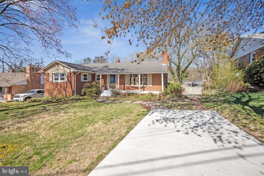 Spacious 5BR/3BA Brick Rambler in College Park Woods – Minutes to UMD

Welcome to this charming five-bedroom, three full bath brick rambler with an open, modern feel, nestled in the serene, tree-lined College Park Woods neighborhood. Ideally located just minutes from the University of Maryland, Buck Lodge Park, neighborhood parks, and two nearby golf courses.

The immaculate interior features a renovated kitchen, updated contemporary bathrooms, and refinished gleaming hardwood floors. The spacious main level offers a center-hall layout separating the living and entertaining areas from the bedroom wing. The bright living room features a fireplace and a large picture window overlooking the front yard, while French doors from the dining room lead to a new rear deck—perfect for morning coffee or warm-weather gatherings.

The renovated kitchen includes white cabinetry, stainless steel range, quartz countertops, LVT flooring, and access to the deck and side yard. Four bedrooms and two full baths are located on the main level, including a primary bedroom with double closets and a private bath.

The full daylight lower level provides excellent flexibility, with a large recreation room, family room with a second fireplace, an additional bedroom, full bath, laundry room, and walkout access to the fenced backyard. Knotty pine paneling and wood floors add warmth to the rec room, and a partial kitchen makes the space ideal for guests or extended living arrangements.

Conveniently located near I-495, I-95, and Route 295, offering easy access to Washington, DC, Bethesda, and Baltimore. Close to the College Park Metro, Ride On bus routes, and the upcoming Purple Line.

With generous space, quality updates, and a peaceful setting, this home offers comfort, flexibility, and exceptional convenience.