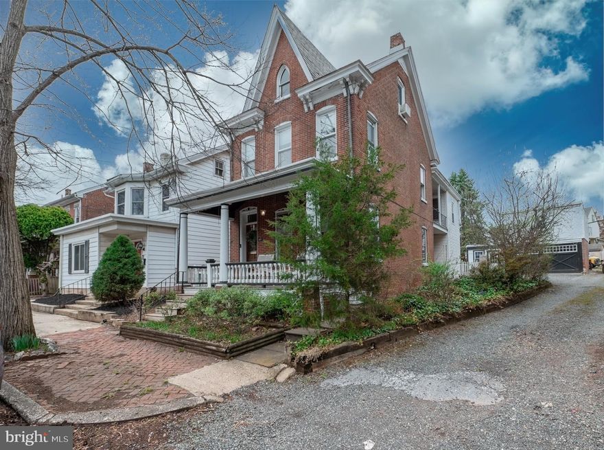 If you like homes with character, this red brick Victorian built in 1900 is for you. Stained glass, pocket
doors, built-in hutches, and chestnut woodwork with rosette corners, scrolls, vintage brass hardware, and
hardwood floors. The main living area includes the living room, parlor, dining room and updated kitchen
with mudroom and full bathroom with a tub. The second floor has 4 bedrooms, a sizeable walk-in closet and
full bath. Through one of the bedrooms is a covered porch overlooking the side yard. The third floor is a
sizable bonus room that can be used as a fifth bedroom. Access to the large basement and laundry can be
found out back through a set of bilco doors. A brand new water heater and natural gas furnace were
installed in 2023 and all new sewer lines out to the street main were installed in 2024. The 2-story, 2-car
garage with a handyman's workshop is accessible from the driveway. Very walkable to the shops and
restaurants on High Street and Memorial Park one block away.