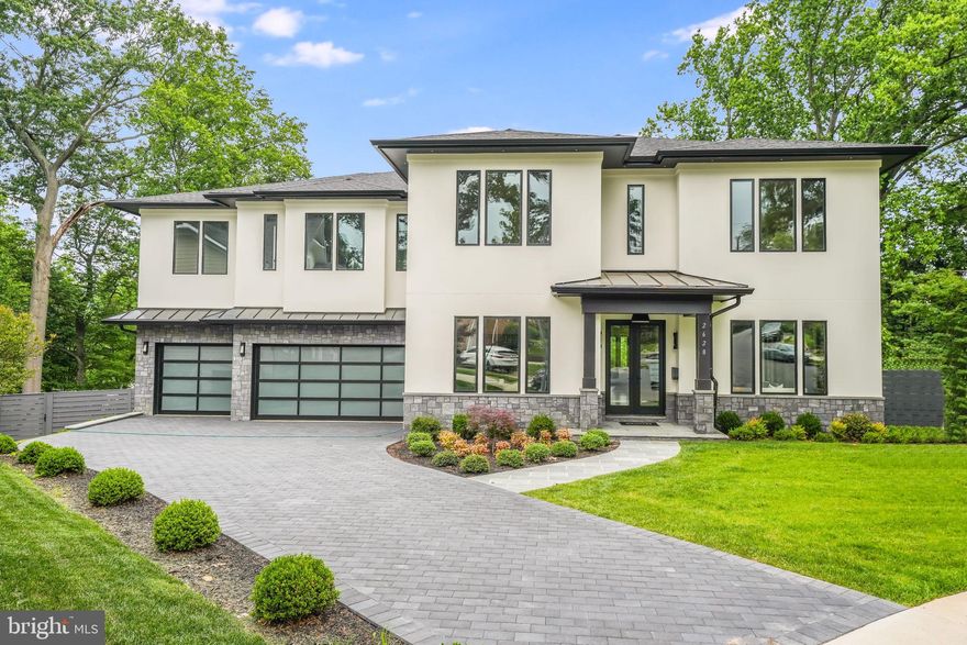 New Construction Home with an ELEVATOR- Move-in Ready!  Priced below 2024 Assessment. 

Introducing this magnificent luxury residence, meticulously crafted by DS Homes, Inc., Nestled on a peaceful cul-de-sac, this modern masterpiece spans approximately 8,200 sq. ft. and boasts a 3-car garage. 

Every inch of this home showcases unparalleled attention to detail and exceptional finishes. The thoughtfully designed open floor plan effortlessly combines all the spaces you desire. From the inviting main-level home office to the elegant living and dining rooms, every corner exudes sophistication. Prepare to be amazed by the state-of-the-art Chef's Kitchen, featuring a spacious Quartz countertop island and top-of-the-line Subzero and Wolfe appliances. No expense has been spared in creating a culinary haven that will delight even the most discerning chef. Convenience and luxury are taken to new heights with the inclusion of an elevator, granting easy access to all 3 finished floors. The sun-filled family room is a true showstopper, featuring a stunning tiled accent wall with a cozy gas fireplace and expansive windows that flood the space with natural light. Step outside to the stone patio, complete with a gas fireplace, perfect for al fresco dining or simply unwinding in the fresh air. A main-level en-suite bedroom tucked away at the rear of the home offers privacy and versatility. Ascending to the upper level, you'll discover 4 en-suite bedrooms, a laundry room, and an open workstation, providing ample space for both relaxation and productivity. The lower level of this home is an entertainer's paradise, designed with indulgence in mind. A striking stone accent wall with an electric fireplace sets the stage for unforgettable gatherings. The Signature Bar, adorned with Quartz countertops, is a true centerpiece, while the walk-in wine room and media room promise endless enjoyment. 

Don't let this chance slip away. Reach out to me today to schedule a private viewing and turn your dreams into reality with this exceptional property. Open this Saturday, 1-3 pm