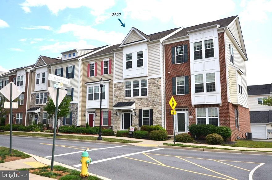 Do not miss this opportunity seeing what this property offers - A beautifully maintained 3-level townhouse located in a most convenient location. Short walk to shopping center, dining, groceries, entertaining and parks. Easy to get to major highway and public transpiration. Located in a sought-after community with lots of amenities. 3 bedrooms/2 full&1half bathroom plus an attached 2-car garage. Filled of natural lights, open concept and high ceiling also adding a touch of comfort. Upgraded kitchen with granite countertop, center island and custom cabinets plus stainless steel appliances. Hardwood flooring throughout the 2nd floors from living room, kitchen and dining area. Master suite and 2 bedrooms are located on the top level, all with carpet. Master suite features with vaulted ceiling, updated bathroom and walk-in closet, the laundry also located on this level. One open living space in the ground floor, it is great to be use for an office, studio or entertainment center.