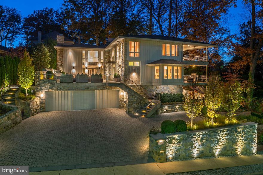 Stunning w/designer finishes, modern luxuries, 3-car GAR & exceptional indoor/outdoor living! Approx 5800 sqft featuring great room w/soaring windows+stone feature walls thruout,Chef's KIT loaded w/SubZero appliances, lux Master w/balcony, BA w/heated marble flrs, WIC w/W/D. Front terrace w/ 2-tiered water feature & heated stairs; expansive & private back flagstone patio w/gas fire strip.MUST SEE!