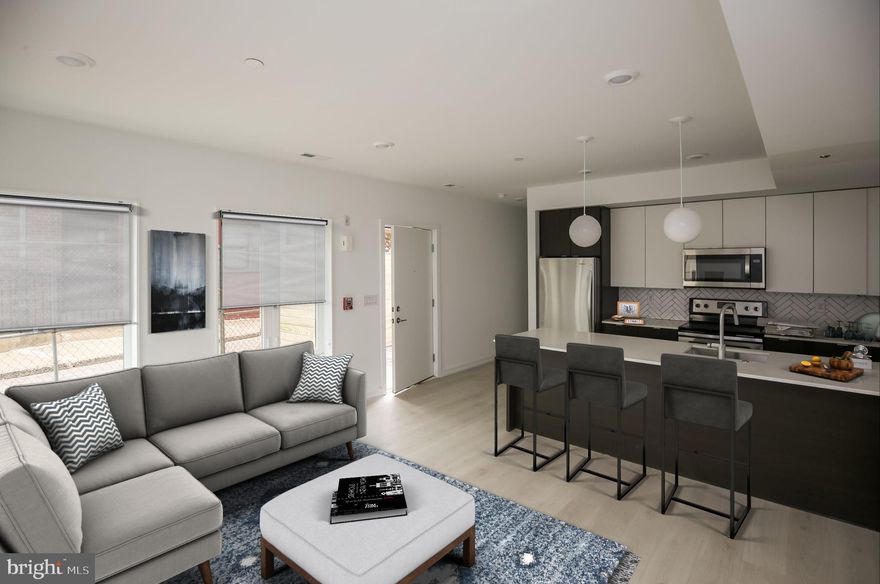 This immaculate apartment is located in the heart of Brewery Row. The community features 63 townhouse-like apartments, offering a clean and contemporary living with modern, stylish finishes. Each pet-friendly unit features top of the line finishes, upgraded kitchen amenities, and an in-unit laundry.

Also features hardwood floors throughout, modern cabinetry and finishes, stainless steel appliances, and washers and dryers for convenience. This unit blends style, location, and value. Off street is available, private parking is also available for an additional fee. This apartment features a yard.

Schedule your tour today!