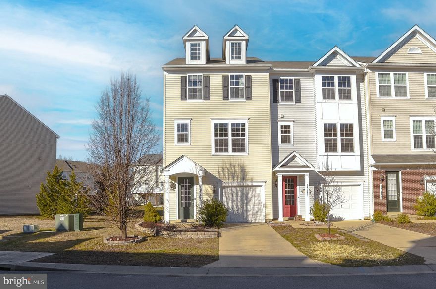 This beautiful end unit townhome is just you've been waiting for!  This home includes 3 bedrooms, 3 full bathrooms, and 1 half bath.  The main level entry foyer with wood floors lead you to the rec room w/full bath which make for a great guest/in law space and has it's own full bathroom and access to the back yard.  As you follow the stairs to the main living area, the open concept style is perfect for entertaining and hosting gatherings.  The gourmet kitchen has granite counters, upgraded cabinets, appliances, island w/bar style seating and recessed lights.    The windows in this end unit townhome create a bright and open feel throughout the home.  The sliders provide access to the large deck for cookouts or relaxing outside.   The upper level gives you access to the primary bedroom with walk in closet. and the primary bath with dual sinks and tile floors.  Two additional bedrooms and a full bathroom complete the upper level of the home.  There is literally space for everyone to spread out or to come together and relax.  Close to schools, shopping and area amenities.  Community amenities include pool access, common areas, playgrounds and more.  Easy  access to Route 235/Route 4 for those commuting to PAX Naval Base or locations north.  Schedule your online appointment today.