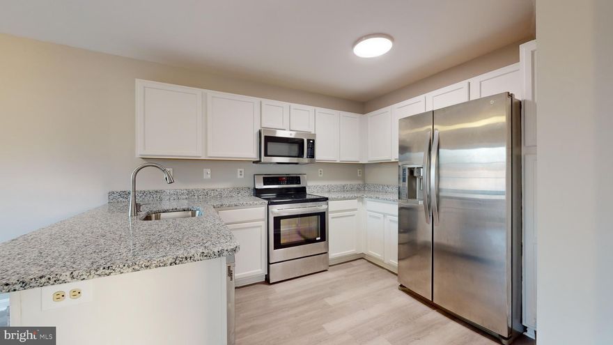 Stunning 4 Bedroom, 3.5 Bath End Unit Townhome in Waldorf, MD - Completely Renovated!
Welcome to your dream home! This beautifully renovated end unit townhome offers modern elegance and spacious living in the heart of Waldorf, Maryland. With four bedrooms, three and a half baths, and a host of top-notch upgrades, this property is perfect for those seeking style, comfort, and convenience.

Key Features:
- **4 Bedrooms**: Enjoy ample space for your family, guests, or a home office. Each bedroom is designed with comfort in mind, featuring large windows for plenty of natural light.

- **3.5 Bathrooms**: Three full bathrooms and one convenient half bath make morning routines a breeze. The master bathroom boasts a double vanity and ample storage.
- **End Unit**: This townhome is perfectly situated as an end unit, providing extra privacy and a larger yard. Enjoy the benefits of an extended outdoor area for gardening, entertaining, or simply relaxing.

- **Renovated Throughout**: No detail has been spared in this renovation. You'll find upgraded flooring, fresh paint, and stylish fixtures throughout the home.

- **Gourmet Kitchen**: The kitchen is a chef's dream, featuring granite countertops, stainless steel appliances, ample cabinet space, and a peninsula for additional seating. It's perfect for preparing meals and hosting dinner parties.

- **Spacious Living Areas**: The open concept layout on the main level creates a welcoming and spacious atmosphere. The living room, dining area, and kitchen flow seamlessly, making it ideal for gatherings and quiet time.
- **Cozy Fireplace**: A cozy fireplace in the living room adds warmth and charm, creating a perfect ambiance on chilly evenings.
- **Community Amenities**: The community offers various amenities, including a playground and green spaces, making it a great place to enjoy outdoor activities.

**Convenient Location**: Located in Waldorf, MD, you're close to shopping centers, restaurants, schools, and major commuter routes, making your daily life easier and more enjoyable.

This renovated 4-bedroom, 3.5-bath end unit townhome is a rare find and won't last long. Don't miss the opportunity to make this your new home sweet home. Schedule a showing today and experience the luxury and comfort for yourself!