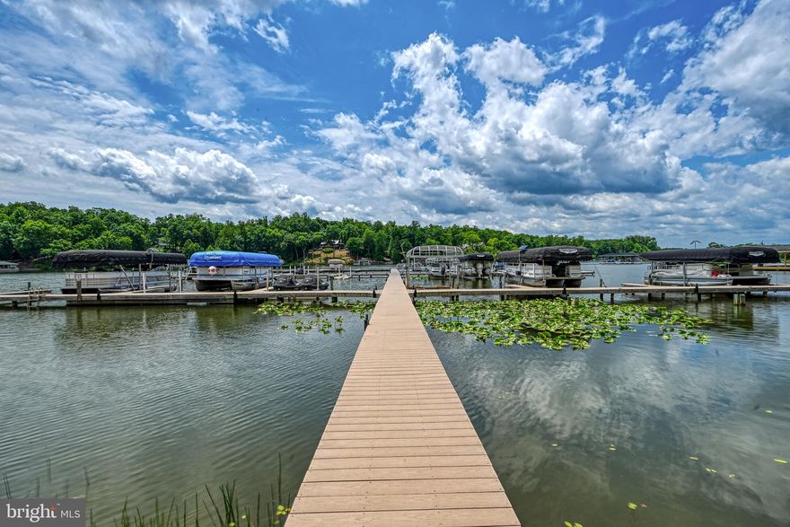 Lake life starts here!  Build your dream home on this beautiful .96-acre lake access lot in the sought-after Shorewood Subdivision on the public side of Lake Anna, VA!  Located on a cul-de-sac, this spacious lot comes with assigned boat slip (#7) in the common area where you'll enjoy endless fun on the water.  Bring your own builder and your best lake house plans—this property is ready for your vision!  Shorewood is a golf cart-friendly neighborhood with amenities in the common area that include boat slips, a boat ramp, huge sandy beach perfect for relaxing or swimming, and multiple picnic pavilions!  And talk about location, location, location!  You're just minutes from groceries, the ABC store, nail salon, local restaurants, breweries, and all the Lake Anna attractions.  Don’t just dream it—build it and enjoy the lake lifestyle!