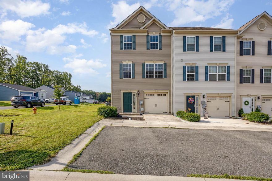 Offer Deadline July 10, 2022 at 7pm. 
Better then New Freshly Painted and New Carpeting was just installed. Former Model Home. This 3 story 3 bedroom, 4 bathroom, end garage townhome has it all. As you enter the home you have a large foyer and a half bath for your convenience. There is also a large rec room with walkout exit to your rear yard. The laundry room and garage are also on this level. Proceed up the stairs to the spacious living room and eat in kitchen with island.  An additional half bath is on this level as well.  There is also a door from the kitchen leading out to your deck. Move upstairs to your Primary Bedroom with walk in closet and Primary Bath. 2 Additional bedrooms complete this level and an additional full bath. Nothing to do here but move in. Schedule your showing today!!