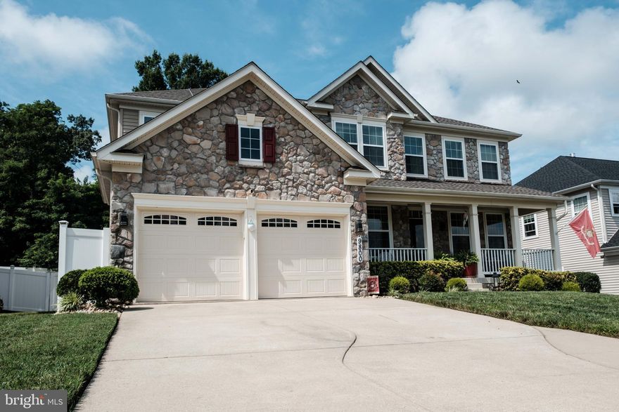 !! Existing VA loan is assumable at an attractive 2.25% interest rate!!
Re-introducing 9800 Leighland Court, an exceptional residence located in the highly sought-after Leighland Meadows community of Waldorf. This stately Colonial seamlessly blends timeless elegance with modern comfort, offering generous living spaces designed to accommodate both everyday living and entertaining.
Upon arrival, you are greeted by impressive curb appeal, manicured landscaping, and a welcoming front porch. Inside, a grand two-story foyer sets an elegant tone and is flanked by formal living and dining rooms—ideal for hosting guests or enjoying refined, quiet moments. The sun-filled family room serves as the heart of the home, highlighted by a dramatic floor-to-ceiling stone fireplace that creates a warm and inviting atmosphere.
The gourmet kitchen is thoughtfully designed for both functionality and style, featuring hardwood flooring, quartz countertops, stainless steel appliances, a double oven, an oversized center island, 42-inch cabinetry, and a well-appointed butler’s pantry. The adjacent morning room is bathed in natural light, accented by designer lighting, and provides direct access to the backyard patio—perfect for indoor-outdoor living.
The upper level offers a spacious primary suite with a lovers lounge,  walk-in closet and a spa-inspired ensuite bath. Three additional bedrooms include one with a private ensuite and two that share a full hall bathroom. An upstairs laundry room adds convenience and enhances the home’s practical layout.
The fully finished basement expands the living space significantly and is ideal for entertaining, featuring a fifth bedroom, full bathroom, and ample room for recreation, media, or gatherings. Additional highlights include a main-level home office or den, a fenced backyard with an inviting patio, a whole-home surround sound system (Sonos), and abundant storage throughout.
As an added benefit, the existing VA loan is assumable at an attractive 2.25% interest rate. This remarkable home presents a rare opportunity to enjoy comfort, style, and value in one of Waldorf’s premier communities.