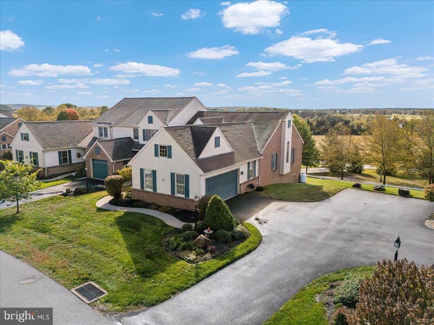 *NEW ROOF INSTALLED NOV 11* A one floor end townhome, this updated property in beautiful Summerfield, overlooks farmer's fields and valleys to the south. The kitchen has granite counters, tile backsplash, stainless appliances and bar seating.  The vaulted first floor is bright with patio doors leading to a large raised deck.  Hardwood covers the kitchen, dining and living room, entry and master bedroom.  The master bathroom has a tile shower with glass doors and new vanity.  Two generously sized guest bedrooms along with a hallway laundry complete the first floor.  The lower level has a large family room with built-in shelves, a flat screen TV and propane fireplace.  French doors exit to a patio.  Storage space abounds with a large unfinished basement room, numerous closets, and pull down stairs above the attached two-car side entry garage.  An energy efficient geothermal system is used for heating and cooling.  Lawn care and snow removal (to your garage door) and common area maintenance are taken care of by the HOA for only $900/year.  Summerfield at Elverson is located in the quaint town of Elverson in the northwestern corner of Chester County.  Quiet, safe and friendly with only minutes to a Walmart Plaza and Turnpike exchange in Morgantown.