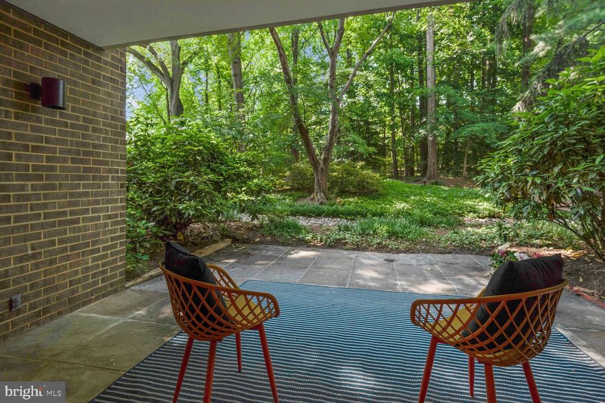 Welcome to 4990 Sentinel Dr. unit 205, where comfortable living meets convenience in the sought-after Sumner Village Community in Bethesda. This spacious 2-bed, 2-bath condo is designed for easy living and is move-in ready with recent updates throughout. Step into this rarely available layout with a delightful walkout to a private flagstone patio, allowing you to embrace the outdoors from the comfort of your own home. Freshly painted walls create a welcoming atmosphere, complemented by new luxury vinyl plank floors and new carpet in the bedrooms. With a large kitchen and an open living area,  it’s perfect for entertaining or hosting dinner parties in your formal dining room. Surrounded by nature's beauty, this condo is nestled among large mature trees, providing a peaceful setting that feels like a private oasis. 

The established and well run association and on site management ensures a well-maintained community and offers an array of amenities for your pleasure. Enjoy the peace of mind with 24/7 security, take a dip in the pool on warm summer days, or challenge your friends to a game of tennis or pickle-ball on the courts. Stay active in the exercise room or host memorable gatherings in the party room. Nature enthusiasts will love the direct access to the Capital Crescent Trail, allowing for scenic walks or bike rides.. The condo also comes with two covered parking spaces, ensuring convenience and protection for your vehicles.

Just a short distance to the Shops at Sumner with a variety of restaurants, shops, grocery stores, and a pharmacy. With easy access to Downtown DC, Bethesda, Potomac, NOVA, Sibley Hospital, and American University, you'll have all the conveniences of urban living at your fingertips. Embrace a happy and peaceful lifestyle in this desirable condo community. Schedule a showing today or visit our upcoming open house.