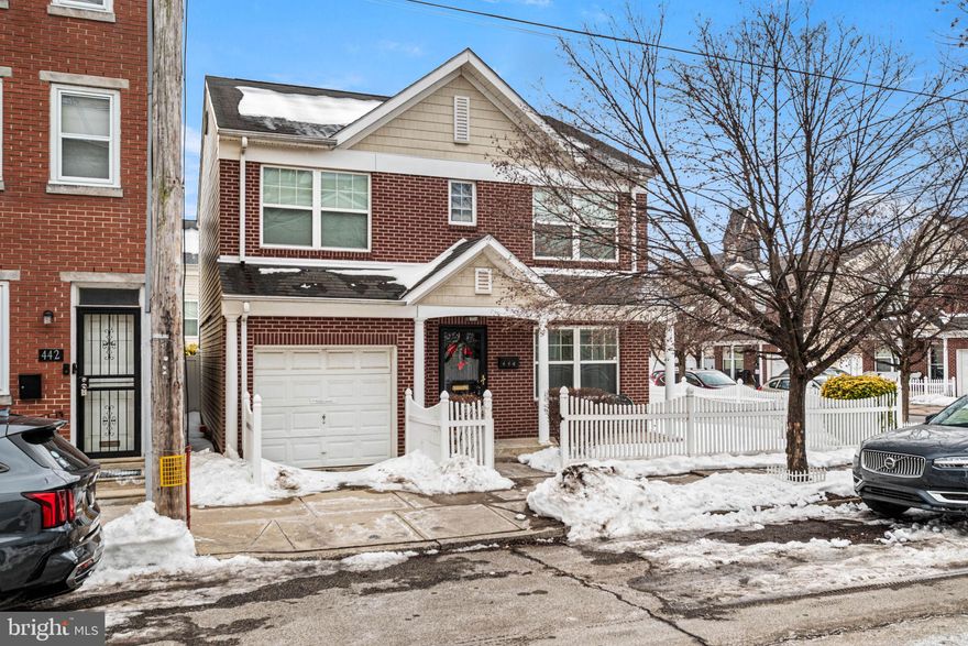 Rarely available detached single-family living awaits you at 444 Manton, a 3-bedroom, 1.5-bathroom gem nestled in the heart of vibrant Dickinson Narrows.  This unique property stands out with an incredible amount of outdoor space, featuring a charming front patio and an expansive side and rear yard, a true urban oasis. Inside, the home offers a thoughtful layout including a spacious living area and the ultimate city luxury: second floor laundry. The inclusion of a private garage solves all your South Philly parking needs and adds significant value. While the home is looking for a little TLC to bring out its full luster, it offers tremendous potential and "good bones" for an owner-occupant or investor looking to build equity in a prime location.  Situated in a prime, walkable location, you’re just blocks from the scenic Dickinson Square Park, the vibrant Italian Market, and the diverse dining of Little Saigon.  With easy access to public transit and major highways, this home combines suburban-style amenities with an unbeatable city lifestyle. Bring your vision and make this South Philly standout your own.  This is an estate, property is being sold AS/IS. Heater is a year old. Bedrooms and garage contents have been digitally removed to show the room space