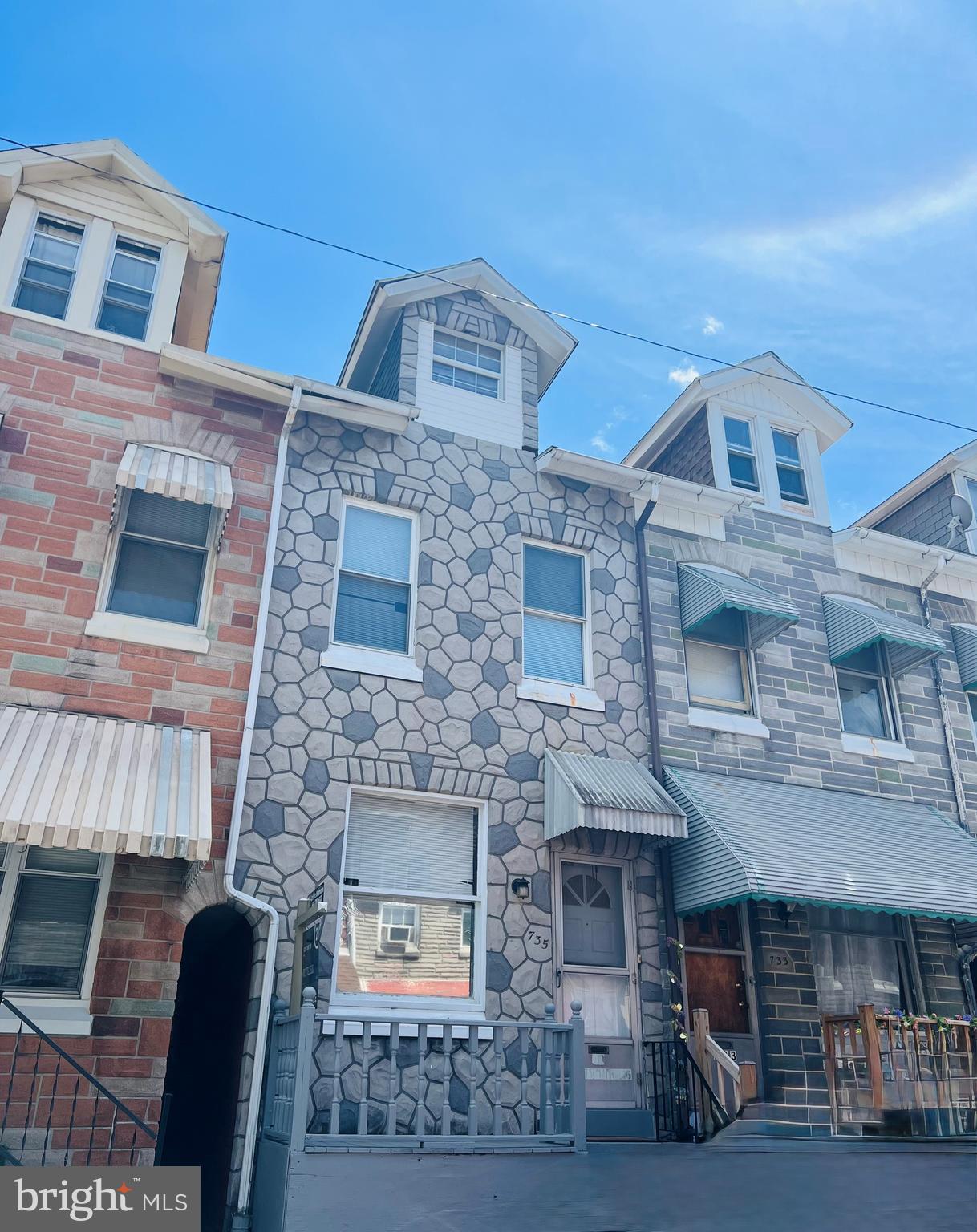 Beautiful stone front home with one-car detached garage. Move into this well maintained 4 bedroom home with new roof. There is an additional room available for family gatherings during the summer season. Close to schools and convenient transportation. Freshly painted and ready for you and your family.
