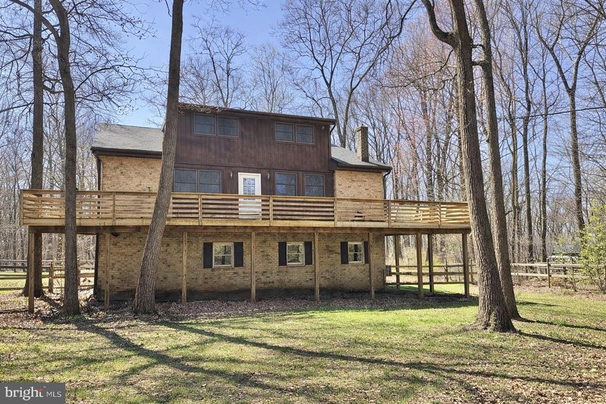 Discover a charming retreat in this delightful detached home, where comfort meets character. Nestled in a serene setting, this residence offers a warm and inviting ambiance, highlighted by One wood-burning fireplace and one propane fireplace —perfect for cozy evenings.

The exterior showcases a timeless blend of brick and wood siding, while inside, an open layout welcomes abundant natural light throughout. An expansive attached garage accommodates three vehicles and provides additional storage, adding to the home’s everyday convenience.

Set on 12.9 acres enrolled in Clean & Green, the property offers endless possibilities for homesteading, recreation, or hunting. Whether you're seeking privacy, space to explore, or a peaceful escape, this property delivers.

This home is ready for your personal touch—an ideal opportunity to create your own sanctuary and the perfect backdrop for years of cherished memories.