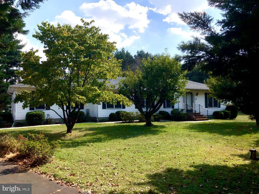 This adorable three bedroom home has A LOT to offer! On a desirable street on the Queen Anne's side of 21620, freshly painted throughout, brand new kitchen range, new master bath vanity, private tree-lined lot, spacious rooms, and attached two car garage off of the paved driveway. Move quickly, this home will NOT last!