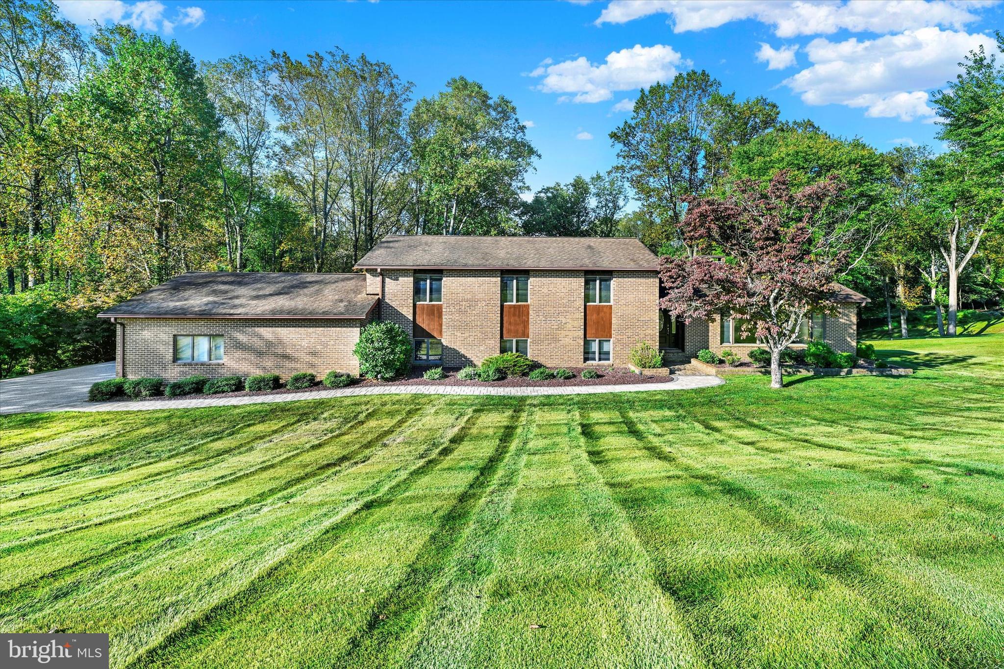 Seeking the ideal, rarely available setting in the Hereford School District? Look no further, as the idyllic community of The Highlands of Hunt Valley offers the unparalleled features of a golf course community comprised of all custom homes, surrounded by mature foliage and open spaces.…Conveniently located near Hunt Valley and Towson, this pristine neighborhood offers a local country club with pool, restaurant & tennis, for those who wish to join. The views are of a golfer’s paradise, along with the natural beauty provided by the four seasons of Mother Nature…Quietly nestled in the heart of this private enclave, you will relax in this most unique world of serene peacefulness. Revel in the views from the balconies and patio, and the many sunny vistas enjoyed from the numerous windows throughout the home! The contemporary style is timeless, offering cathedral ceiling, classic wood floors, handsome field stone fireplace, renovated primary bath, lower level family room, plus guest bedroom or office, full bath & daylight laundry room w/view of fairway! A spacious driveway for guest parking complements the oversized two car garage…Cherished by long time owners, this solidly constructed home awaits the next generation of happy new owners!