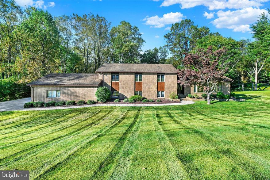 A Rare Gem in the Hereford School District!
Dreaming of the perfect blend of tranquility, beauty, and convenience? Welcome to The Highlands of Hunt Valley—a rarely available treasure nestled within one of the area’s most coveted golf course communities. Here, every home is custom, every season paints a new masterpiece, and the surroundings of mature trees and rolling greens create a serene, storybook setting.

Perfectly positioned near Hunt Valley and Towson, this pristine enclave offers access to a private country club featuring a sparkling pool, tennis courts, and a welcoming restaurant for those who wish to join. The views are nothing short of breathtaking—rolling fairways, golden sunsets, and the ever-changing palette of nature’s four seasons.

Tucked quietly in the heart of this peaceful retreat, the home itself invites you to unwind and soak in the beauty from its sunny balconies, stone patio, and walls of windows that frame the outdoors like fine art. The timeless contemporary design boasts soaring cathedral ceilings, classic hardwood floors, and a striking fieldstone fireplace. The renovated primary bath exudes comfort and style, while the lower level features a bright family room, guest suite or office, full bath, and a cheerful daylight laundry room overlooking the fairway.

An oversized two-car garage and spacious driveway provide ample guest parking. Lovingly maintained by long-time owners, this solidly built home now awaits the next fortunate chapter—a new generation ready to enjoy its rare blend of sophistication, serenity, and enduring quality.