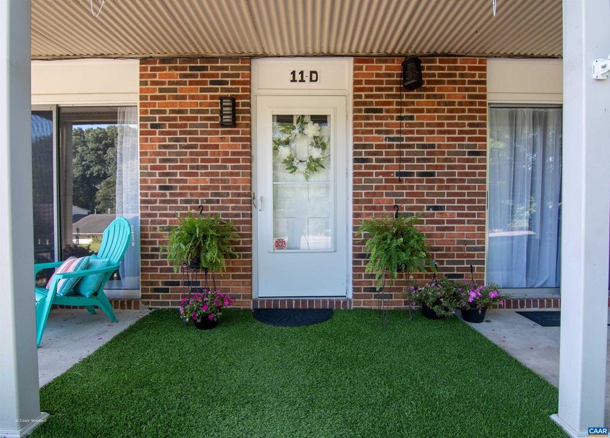 Completely remodeled 2-bedroom, 1-bath one-level condo with a cozy fireplace and serene South River backdrop! Freshly painted with new light fixtures, this move-in-ready home features a fully updated bathroom with new shower and vanity, plus a bright kitchen with new cabinet doors, a new refrigerator, all new window screens, and a new washing machine.  Adjacent to the scenic South River and close to shopping, dining, and commuter routes, this stylish condo offers the perfect blend of comfort, convenience, and natural beauty. Everything has been done?just unpack and enjoy your riverside retreat!,White Cabinets,Fireplace in Living Room