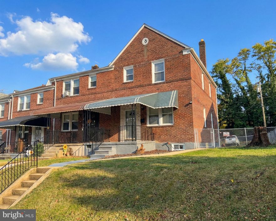 Welcome home to 4433 Old Frederick Road, a beautifully updated end-of-group brick townhome that perfectly blends solid construction with modern, high-end finishes. Radiating with natural light and boasting a prime corner lot position, this turn-key property is ready for you to move right in and start making memories. Step inside to discover a spacious, open-concept main level featuring stunning new luxury vinyl plank flooring in a chic, modern gray wood tone. The neutral color palette and recessed lighting create a bright and airy atmosphere, making the living space feel expansive and inviting. The heart of the home is the fully renovated kitchen, designed for both function and style. A center island with breakfast bar seating and stylish pendant lighting serves as the perfect focal point, while a suite of gleaming stainless steel appliances ensures you have everything you need to cook gourmet meals from day one. The spa like bathrooms feature elegant floor-to-ceiling custom tile work, modern vanities with sleek fixtures, and a contemporary round mirror that gives the space a boutique look and feel. Need extra space? The fully finished basement offers endless possibilities! With its own dedicated laundry area and pristine flooring, this versatile bonus space is ideal for a home theater, home gym, or the ultimate man cave. As an end-of-group home, you enjoy extra privacy and outdoor space. Out back, you'll find a private parking pad, saving you the hassle of street parking. Convenience is key! Located just minutes from I-695, I-95, and Route 40, your commute will be a breeze. You are also moments away from local shopping, dining, and the developing Uplands community. Don't wait! This gem offers the perfect combination of style, space, and affordability. Schedule your private tour today before it’s gone!