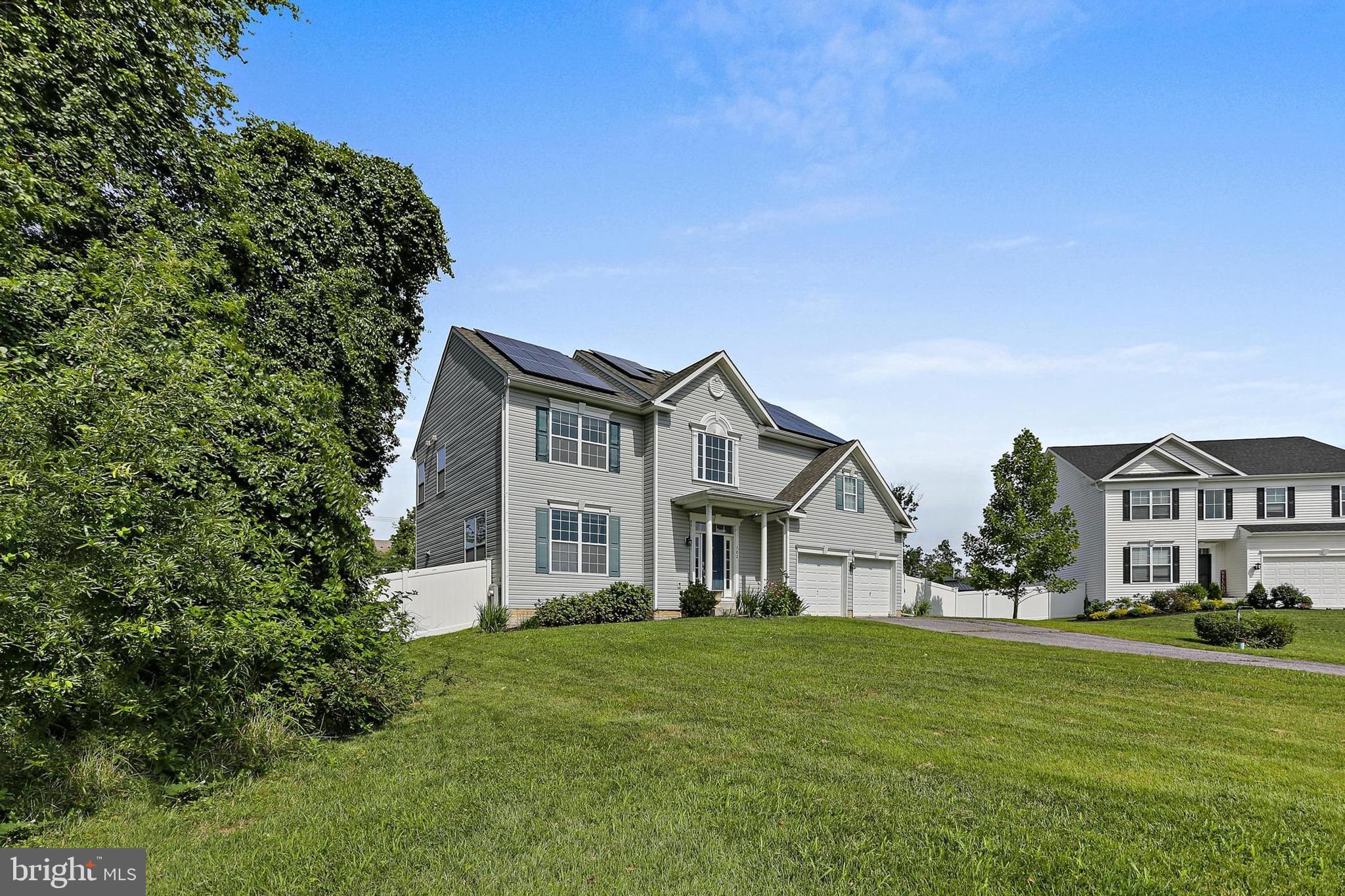 Welcome to 702 Hurricane Hole Court – a spacious, newly painted and inviting home nestled in a quiet Glen Burnie neighborhood. Step inside to find hardwood floors flowing throughout the main level, where a bright dining room and an open-concept kitchen with custom kitchen island seamlessly connect to a generously sized living room – perfect for everyday living and entertaining. Upstairs, you'll find four comfortable bedrooms, including a roomy primary suite with cozy carpet underfoot, a ceiling fan, soft accent lighting, and a custom walk-in closet. The en-suite bath features a relaxing soaking tub, stand-up shower, and double vanity. A shared full bath with a tub/shower combo serves the additional bedrooms – all with carpet and plenty of natural light. The lower level offers a full bath with a tub/shower and walk-out access to the backyard – and the unfinished space is ready for your personal touch, whether it’s a rec room, gym, or storage haven. This home offers both comfort and potential – come see it for yourself!