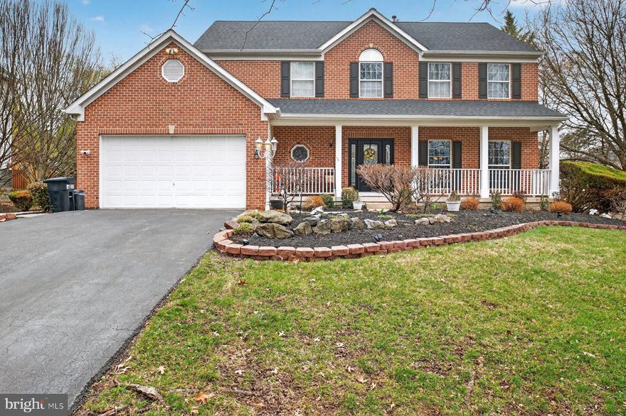 Welcome to 7059 Calvert Drive, a beautifully maintained home in a quiet Elkridge community with convenient access to everything Howard County has to offer. This light-filled home features a warm, open layout with numerous updates since 2020. The main level offers a bright living room, formal dining area, and a fully renovated gourmet kitchen (2021) with quartz countertops, farmhouse sink, wine refrigerator, modern cabinetry, and a custom quartz island with seating for up to nine. The kitchen opens to a cozy renovated family room with custom entertainment wall and wood-burning fireplace (2021).  Upstairs features spacious bedrooms with custom closets (2023), a renovated hall bath (2023), and a private primary suite with a California Closets walk-in closet and renovated primary bath (2026). The finished lower level includes a large recreation space, wet bar (2026), glass-enclosed pool room, and full bath.  Enjoy the private backyard and expansive deck, perfect for entertaining. Major updates include roof (2020), HVAC (2023), water heater (2025), and renovated laundry with new washer and dryer (2025).  Conveniently located near I-95, Routes 100, 295, and 32, BWI, MARC, shopping, dining, and parks. Professional Photos coming Wednesday