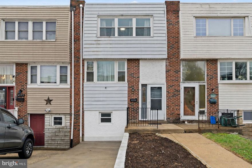 Welcome to Millbrook, where space, flexibility, and peace of mind come together in a convenient Northeast Philadelphia location. With driveway parking out front and a long list of important updates already completed, this home offers the kind of value buyers are looking for. Improvements include all new windows and a custom oversized sliding glass door in 2022, new flooring throughout in 2021, an updated full bath, a new roof and hot water heater in 2024, and a brand new heater and central air system installed in January 2026.

Step inside to a bright and spacious main level featuring a sun-filled front kitchen and an open dining and living area that offers a comfortable flow for both everyday living and entertaining. The oversized sliding glass doors bring in great natural light and open to the expansive backyard, giving you even more room to spread out and enjoy.

Upstairs, the primary bedroom offers a spacious retreat with a dressing area/entry closet, built-in shelving, and access to the updated full hall bath. The additional bedrooms offer a unique flexible layout with a sliding partition wall between them, allowing the space to be used as two separate bedrooms or one larger combined room depending on your needs this layout gives you versatility that is hard to find.

The basement adds even more usable living space and includes a fourth bedroom, a half bath, laundry, a large common area ideal for a playroom, media room, or second living space, plus a rear room that could be used for storage, a home office, workout area, or hobby room.

Conveniently located near major transportation routes, shopping, and entertainment, this home offers the space you need, the updates you want, and the flexibility to fit a variety of lifestyles.